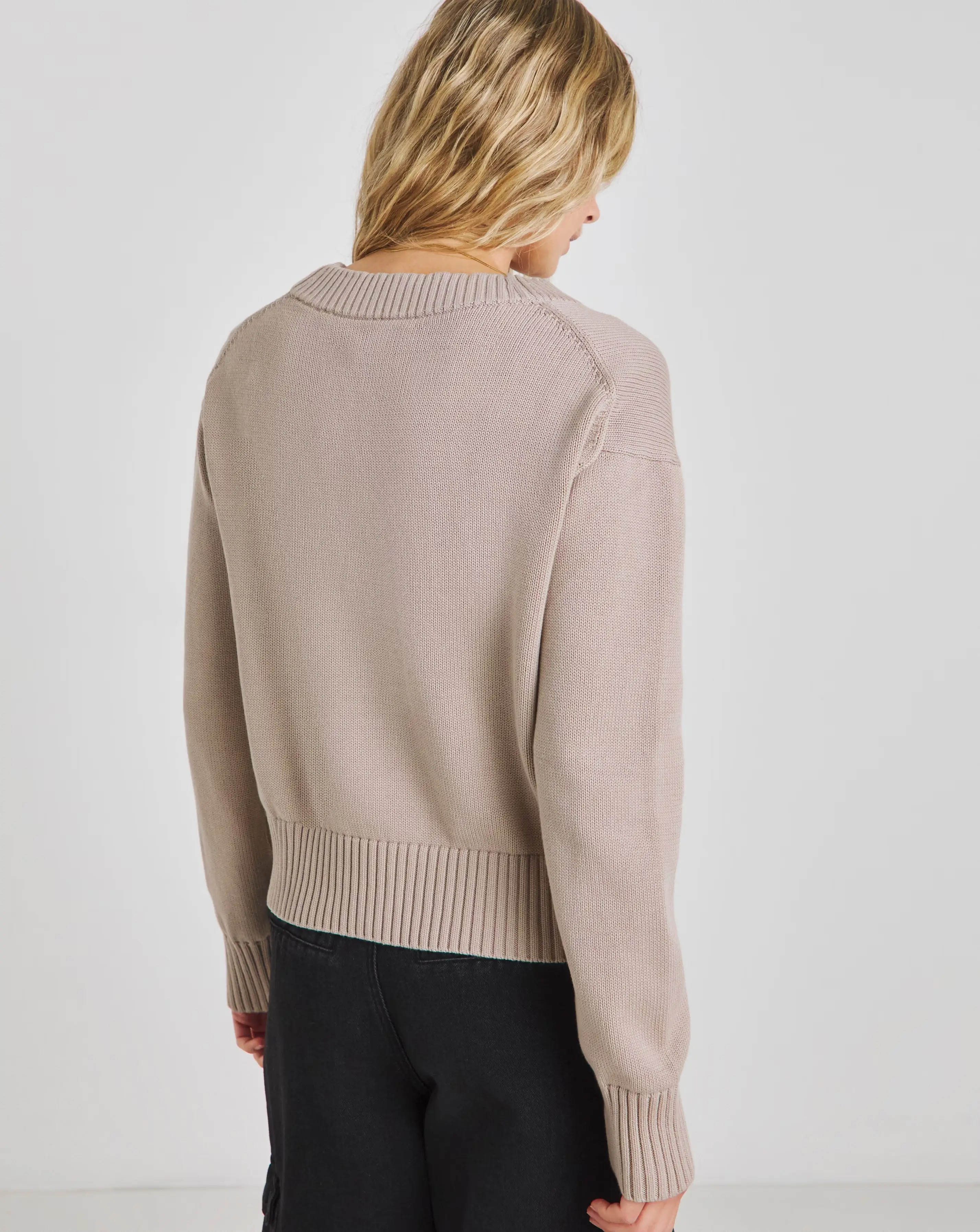 100357-calvin-klein-jeans-ck-embroidered-badge-v-neck-sweater-1.webp