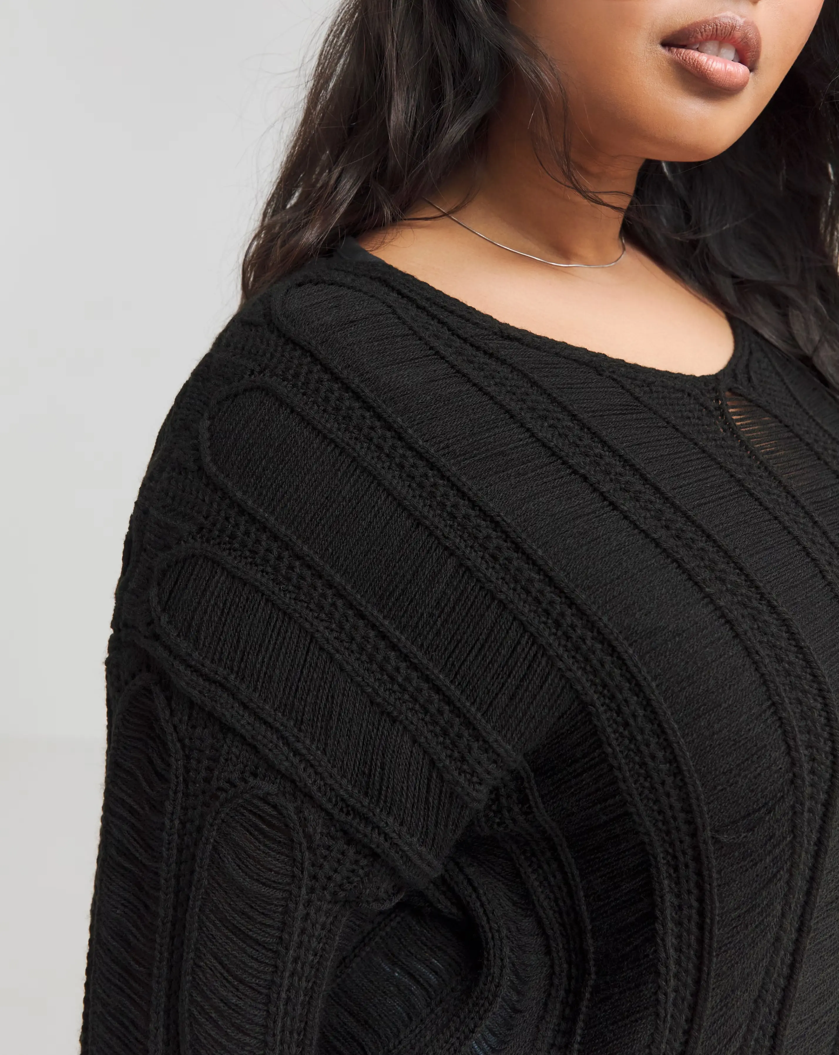 101336-black-ladder-detail-v-neck-jumper-1.webp