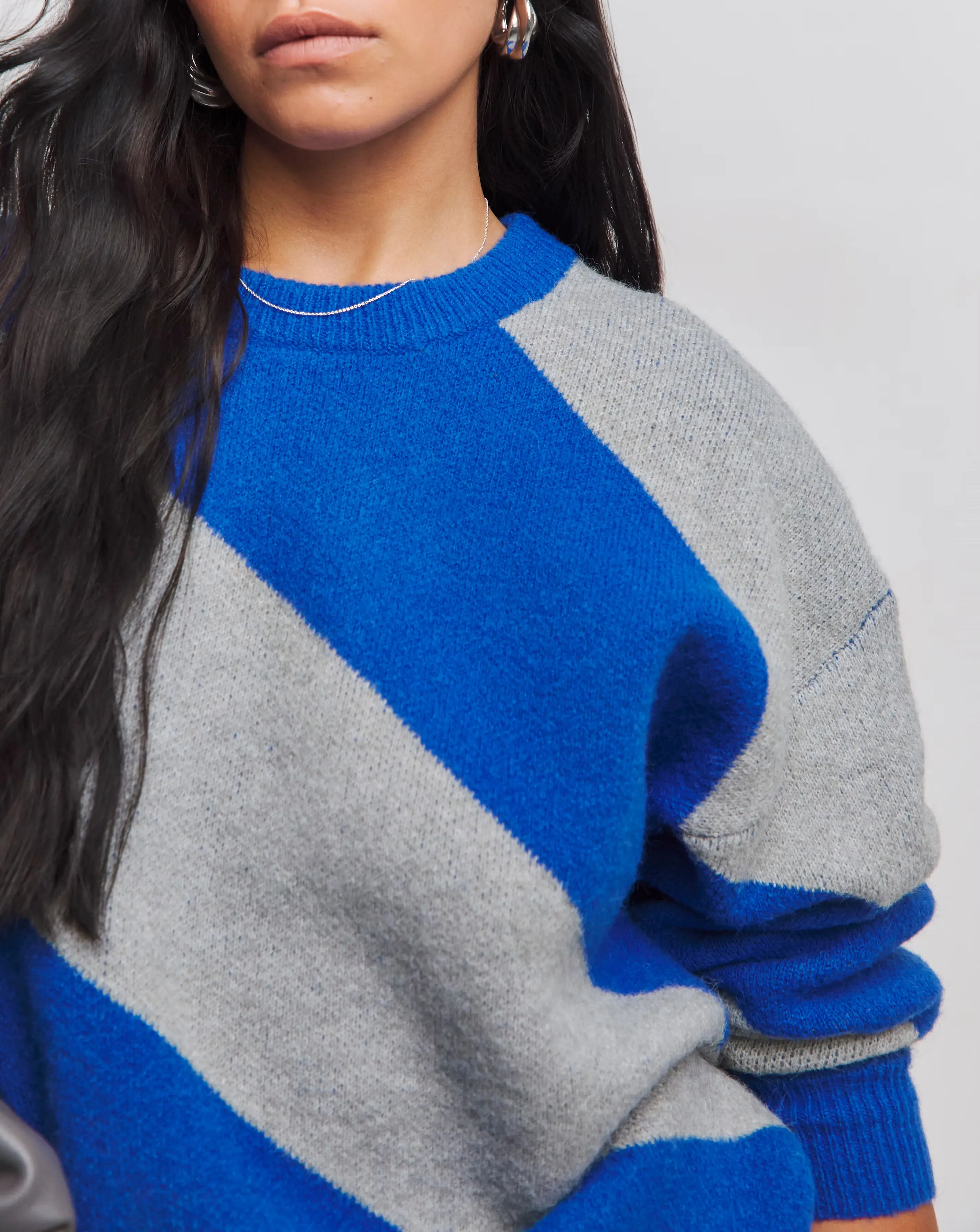 101593-blue-and-grey-diagonal-stripe-jumper-1.webp