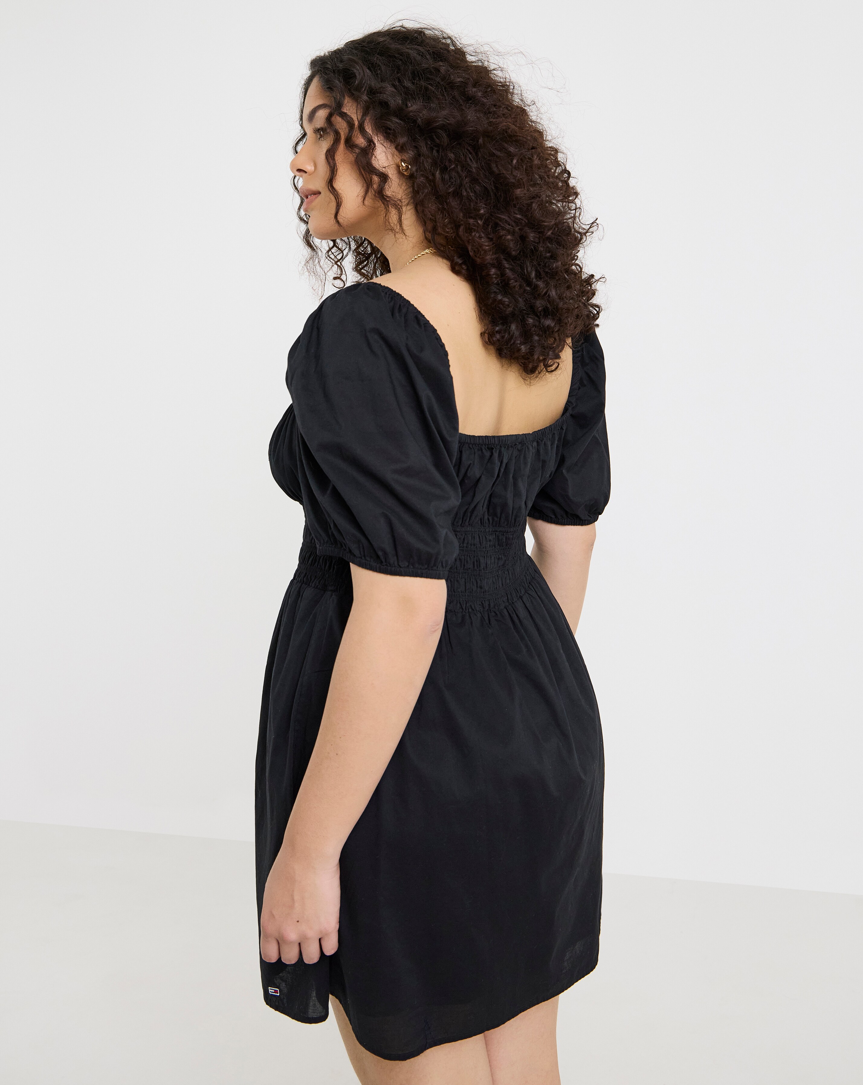 103742-tommy-jeans-cotton-mini-dress-1.webp
