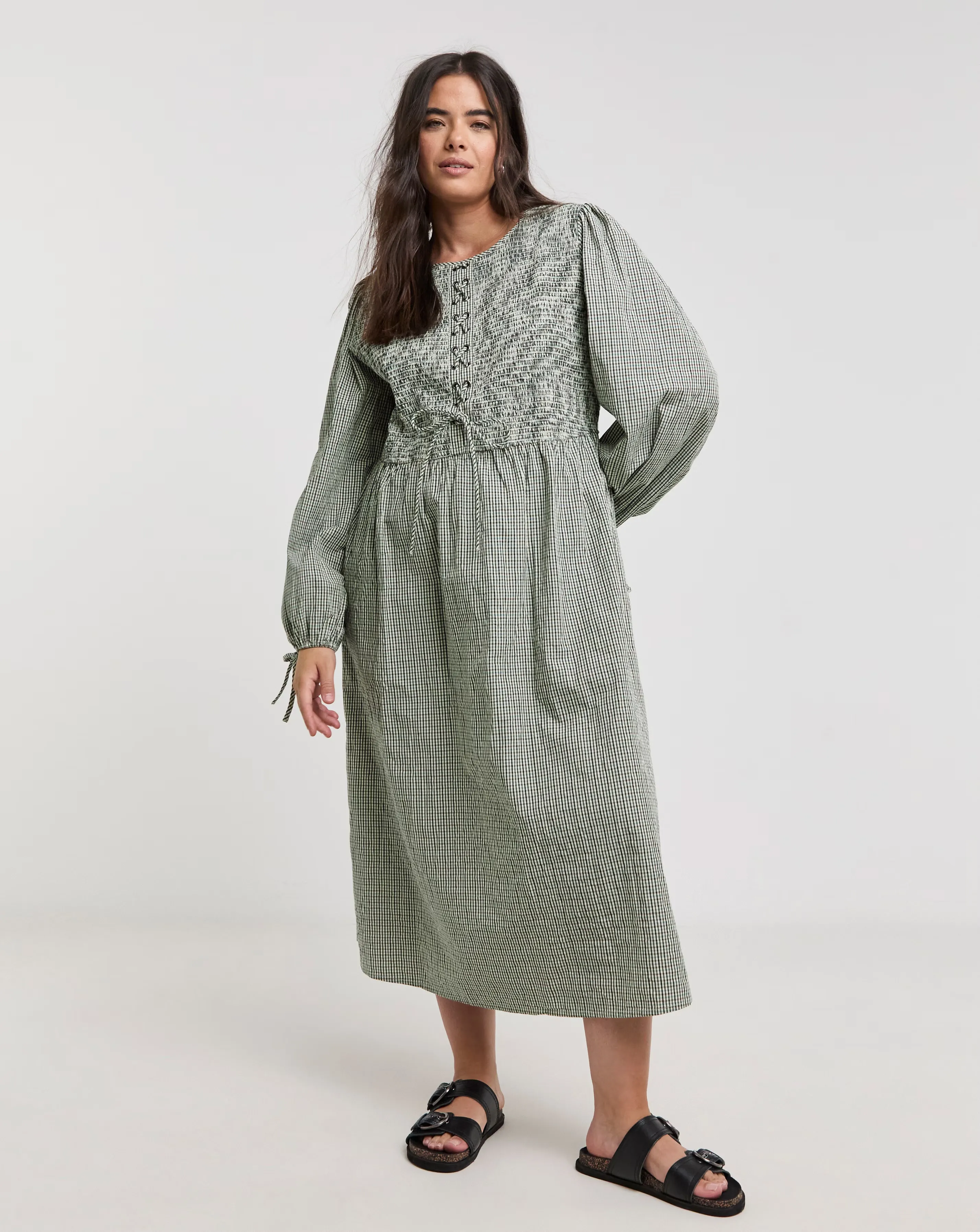 103786-native-youth-shirred-check-midi-dress-1.webp