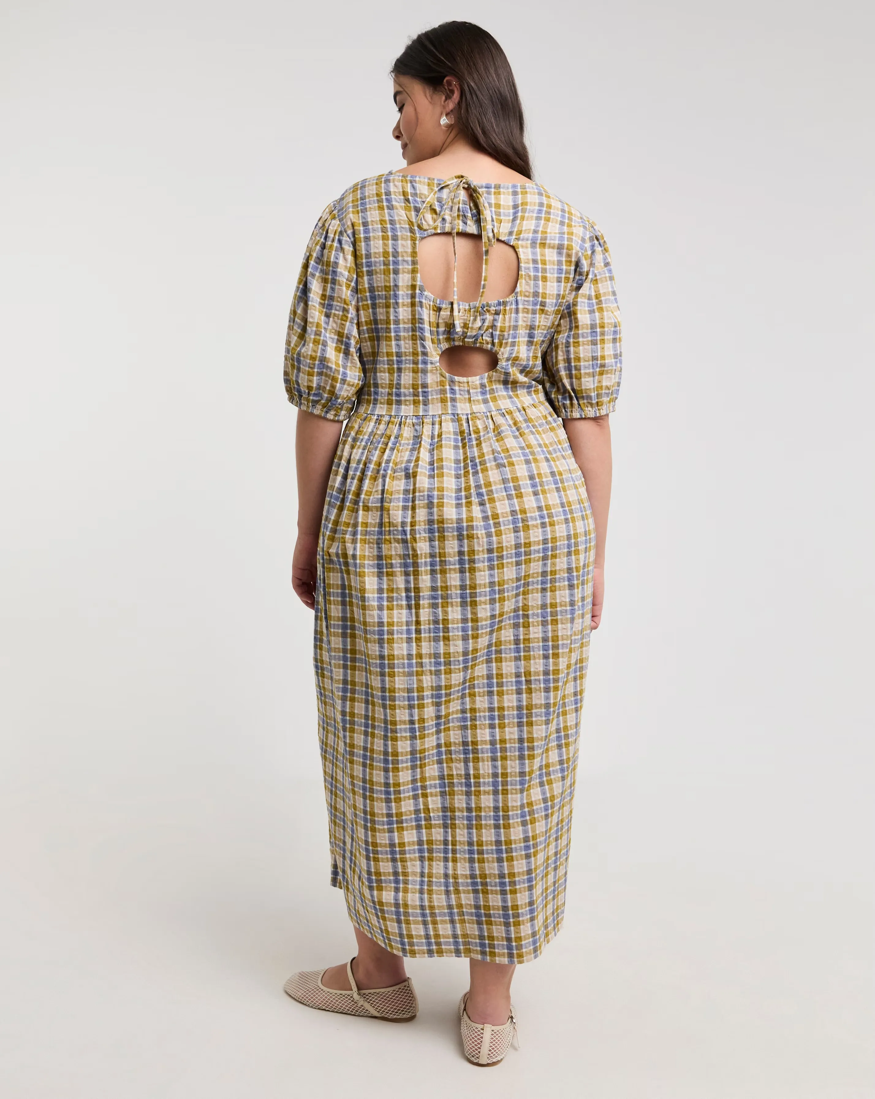 103885-native-youth-check-cut-out-back-midi-dress-1.webp