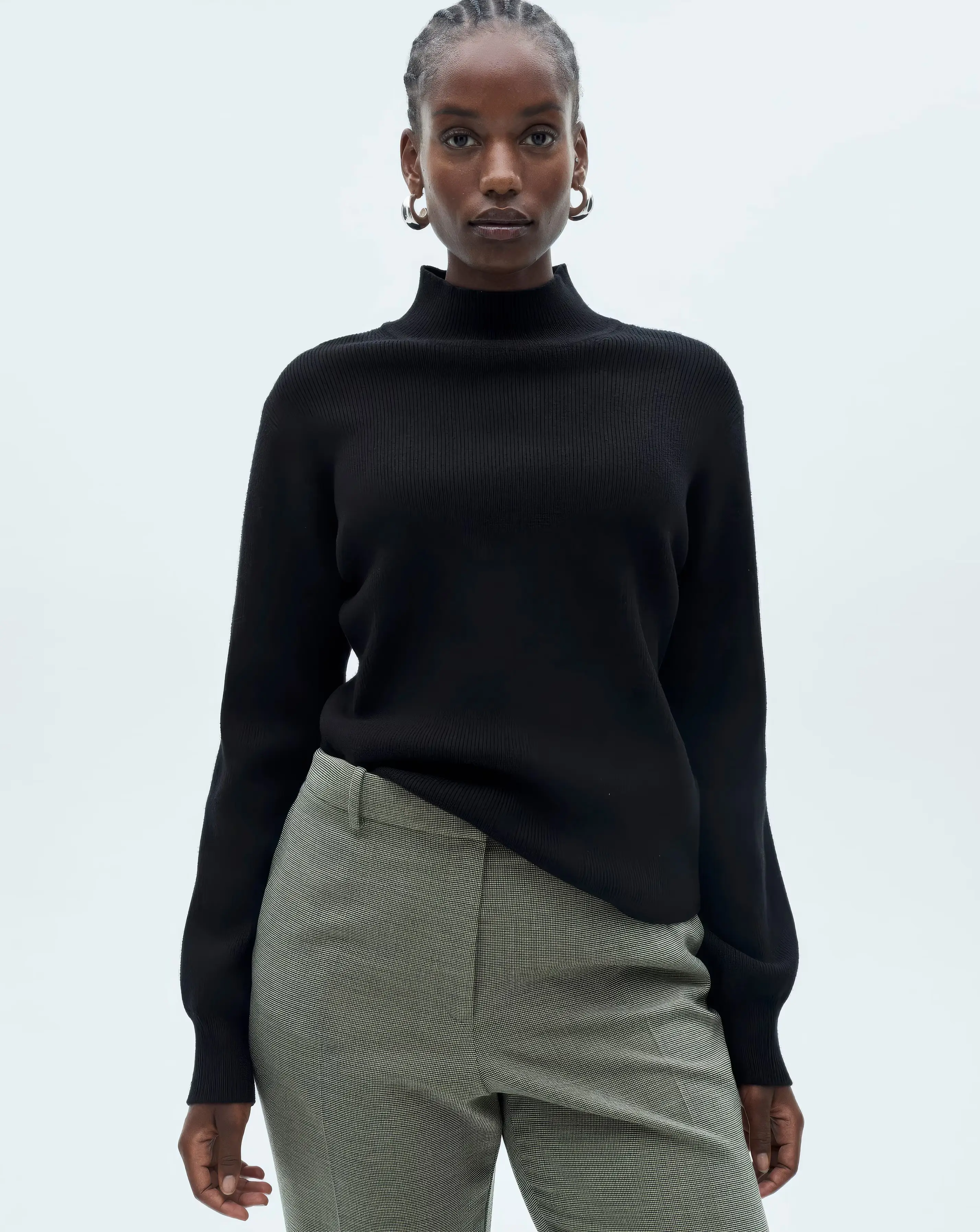 104263-mango-high-neck-ribbed-sweater-1.webp