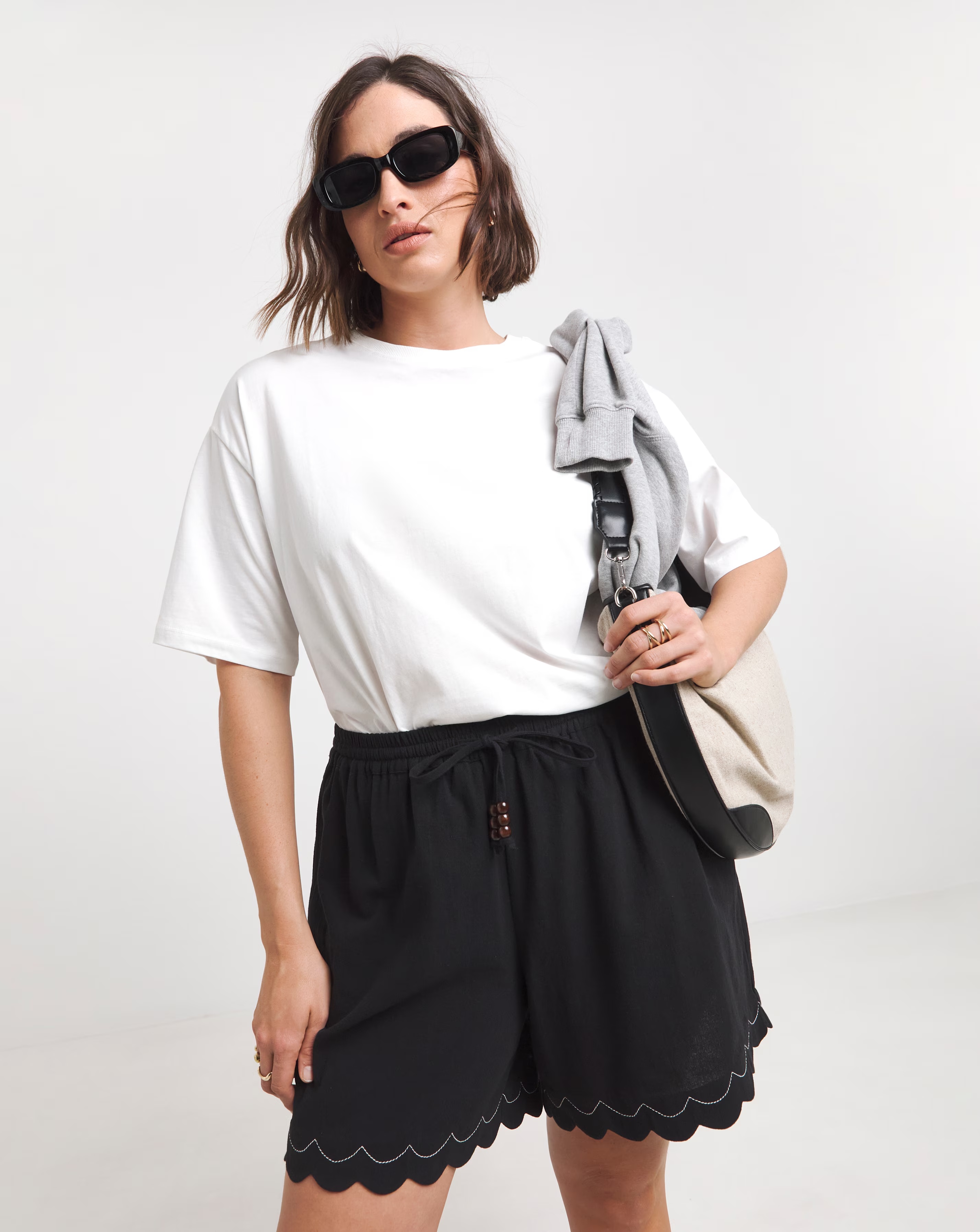 104876-simply-be-scallop-hem-shorts-1.webp