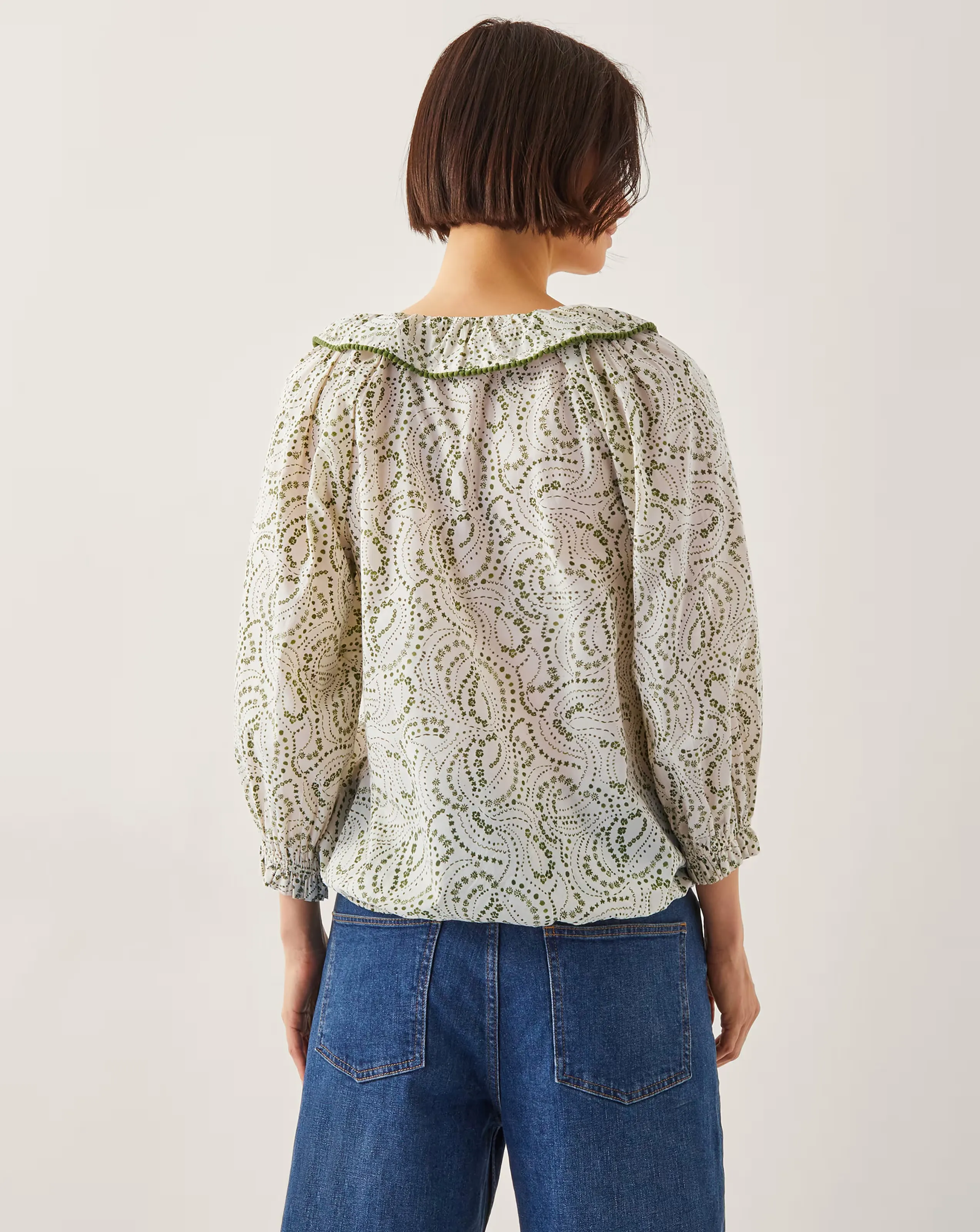 109835-monsoon-delma-pintuck-frilly-blouse-1.webp
