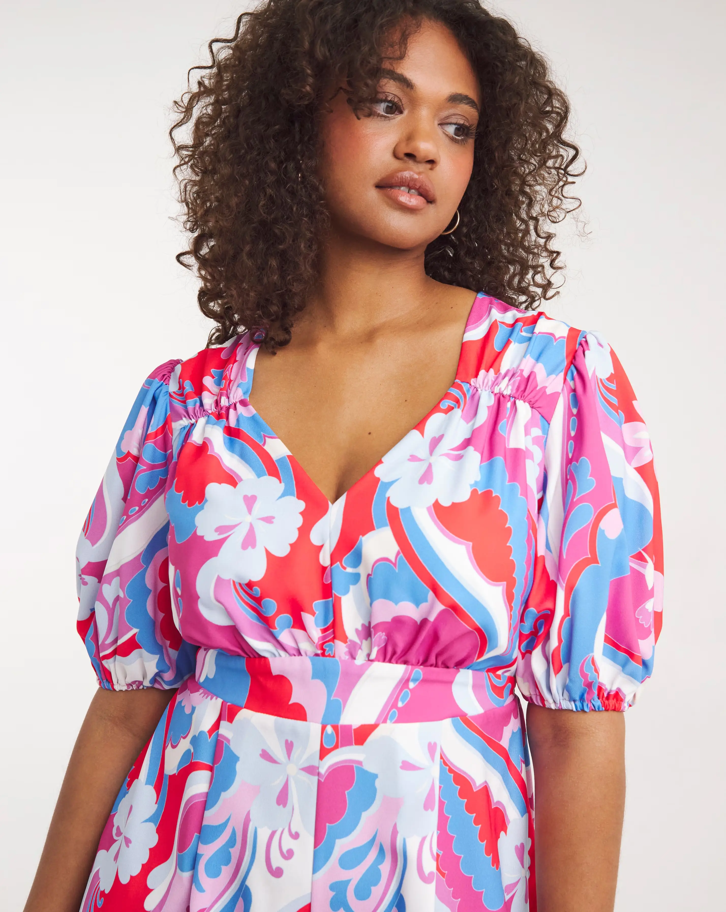 111037-twisted-wunder-puff-sleeve-buttercup-jumpsuit-1.jpg
