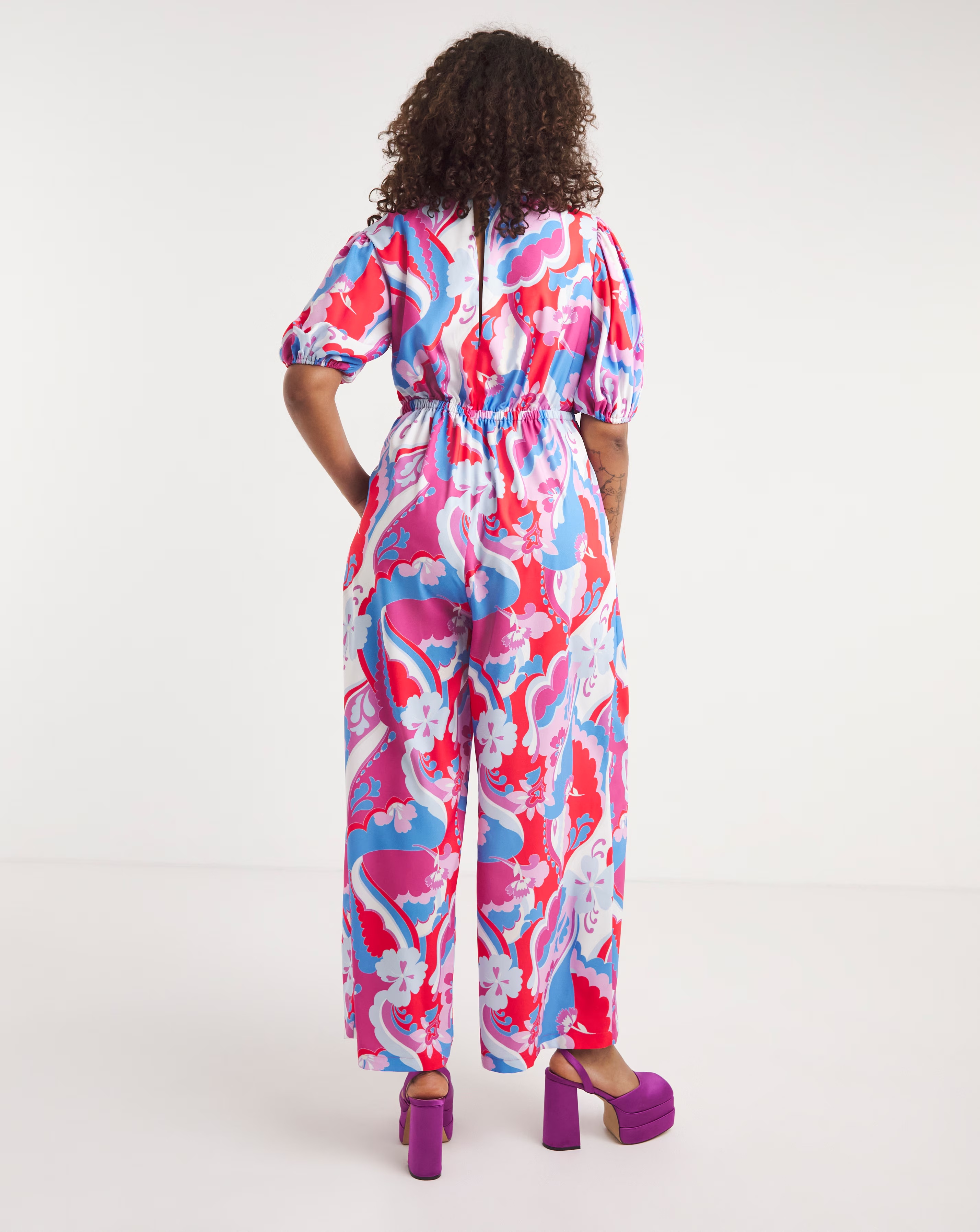 111037-twisted-wunder-puff-sleeve-buttercup-jumpsuit-1.jpg