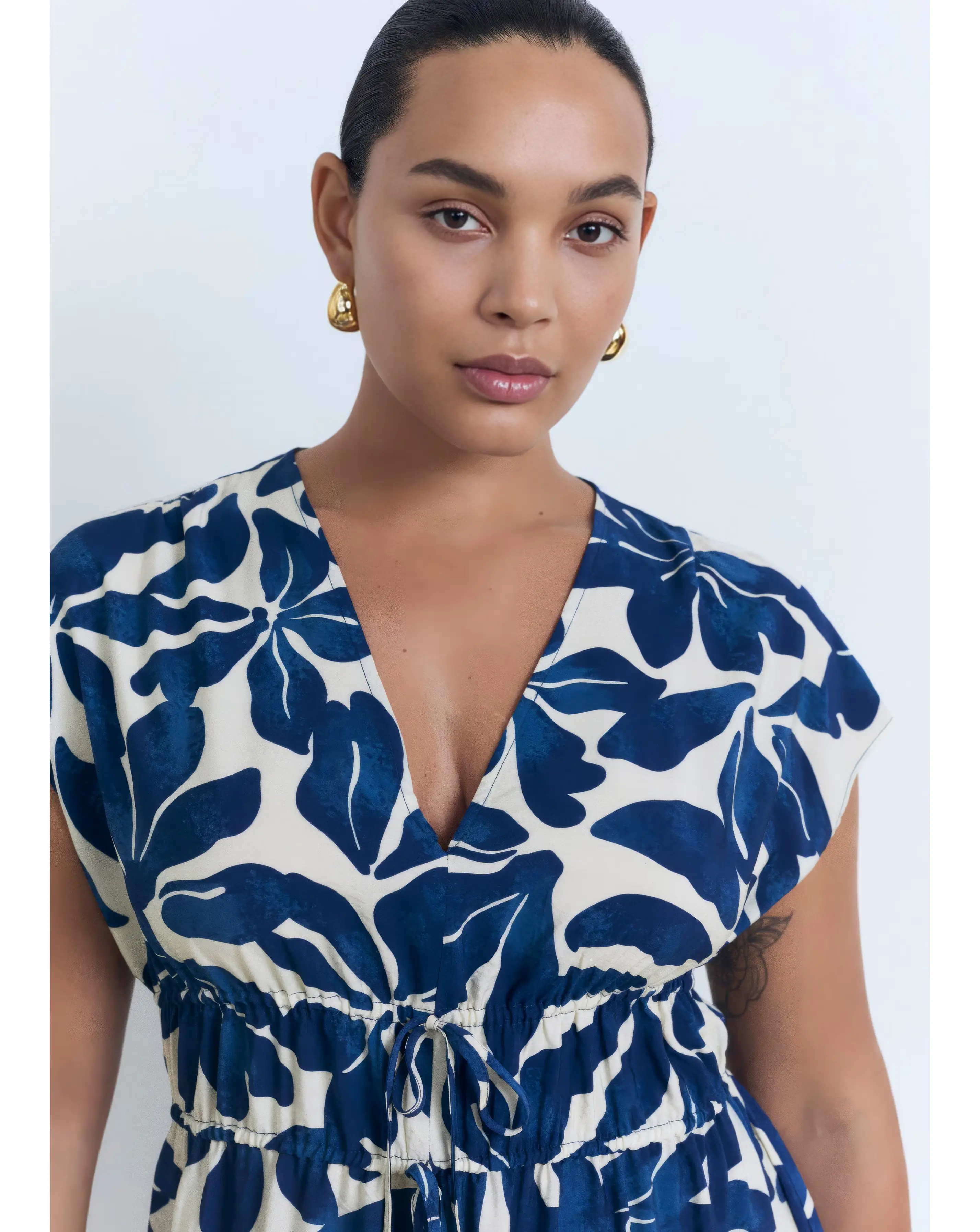 111381-mango-sleeveless-v-neck-midi-dress-1.webp