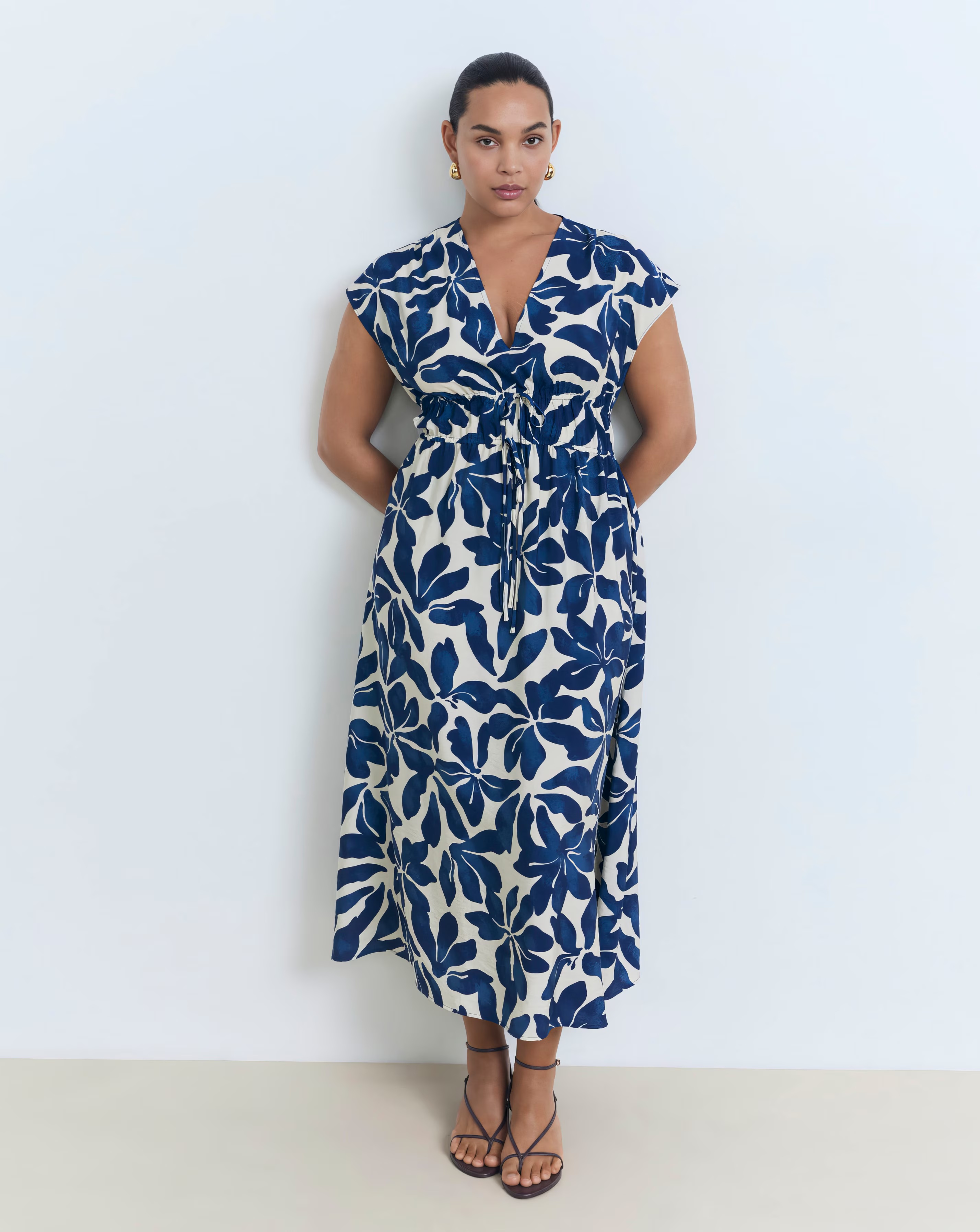 111381-mango-sleeveless-v-neck-midi-dress-1.webp