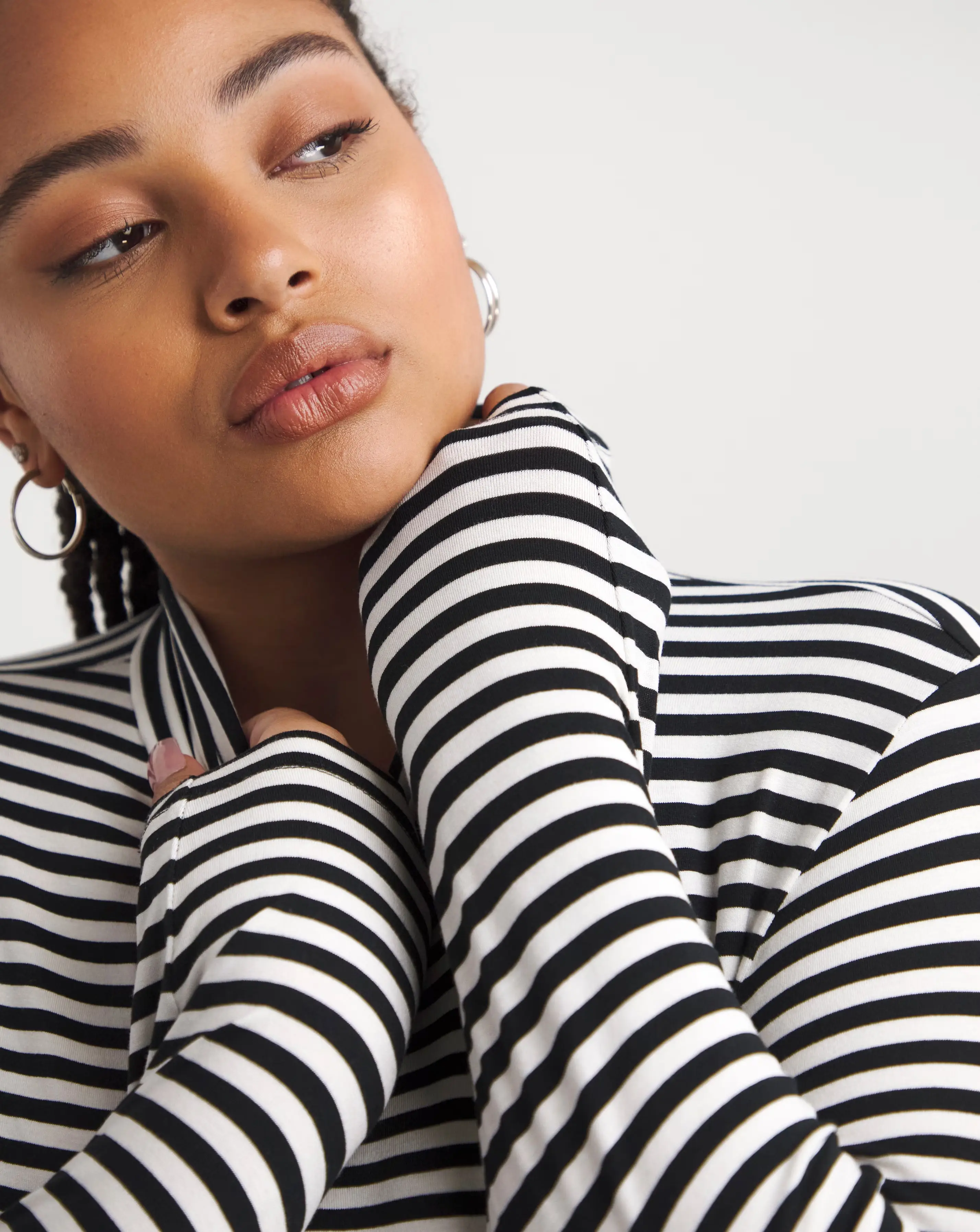 116901-stripe-roll-neck-bodysuit-1.webp