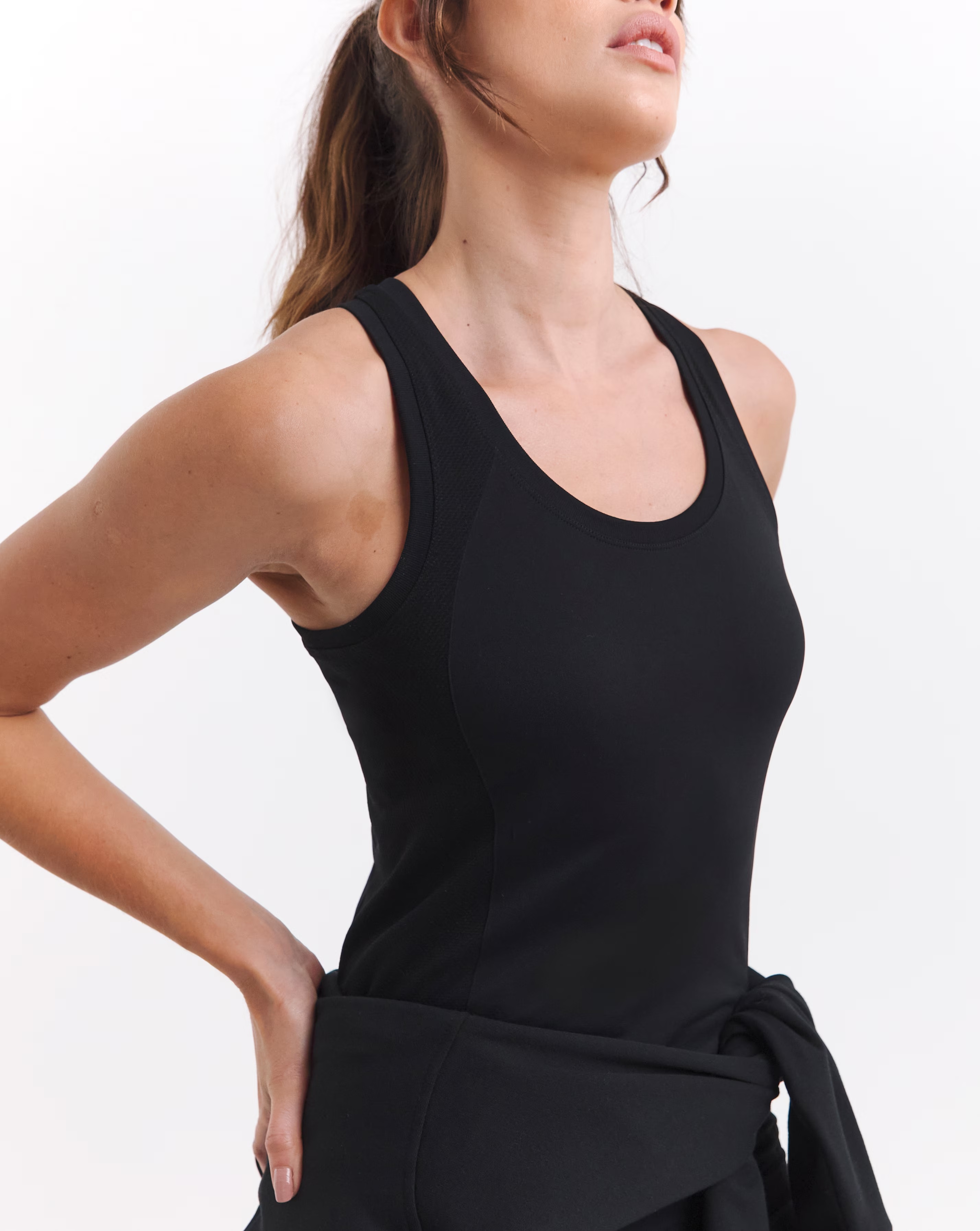 118559-sweaty-betty-athlete-seamless-workout-tank-top-1.jpg