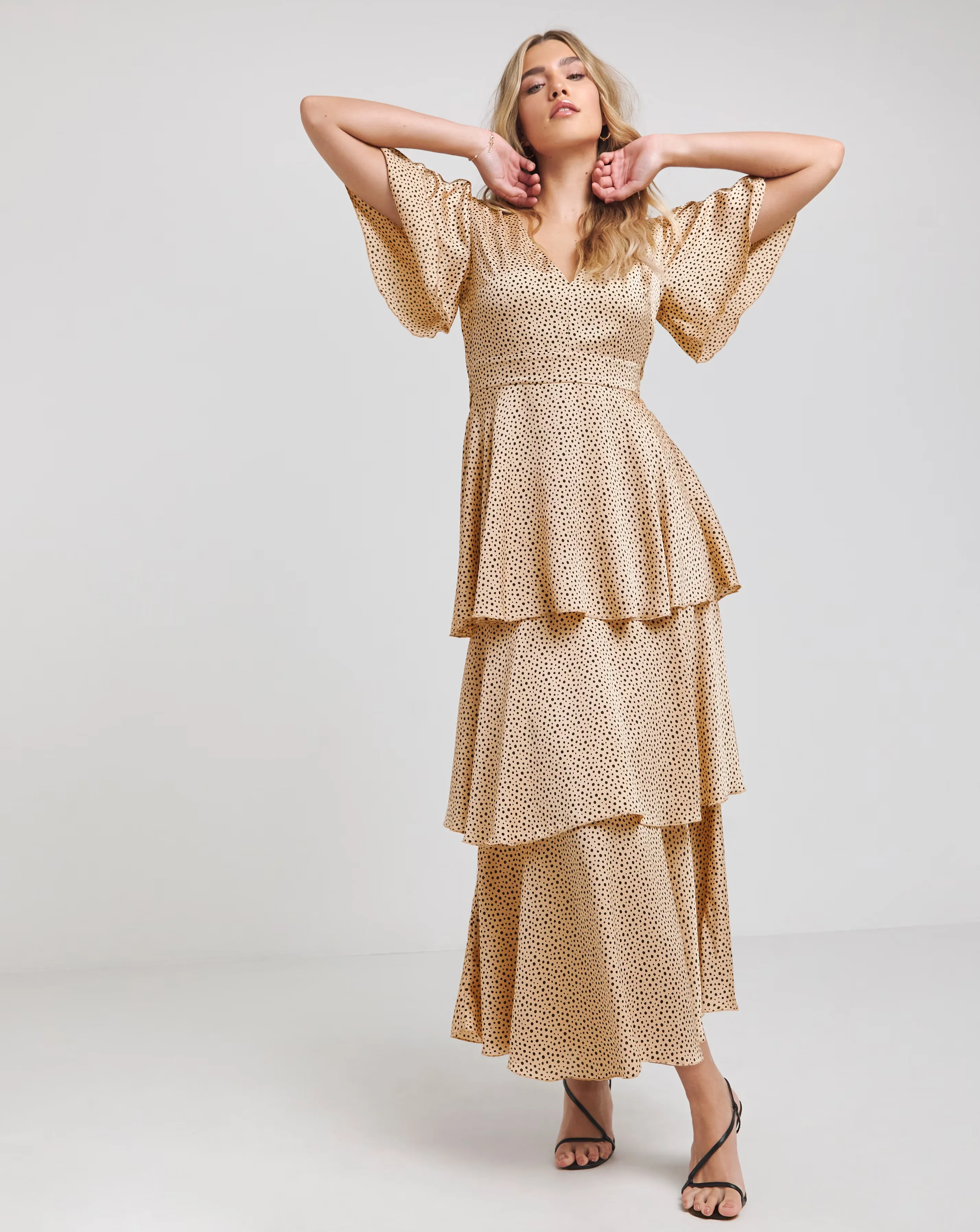 119249-flounce-london-camel-black-spot-satin-tiered-maxi-dress-1.webp