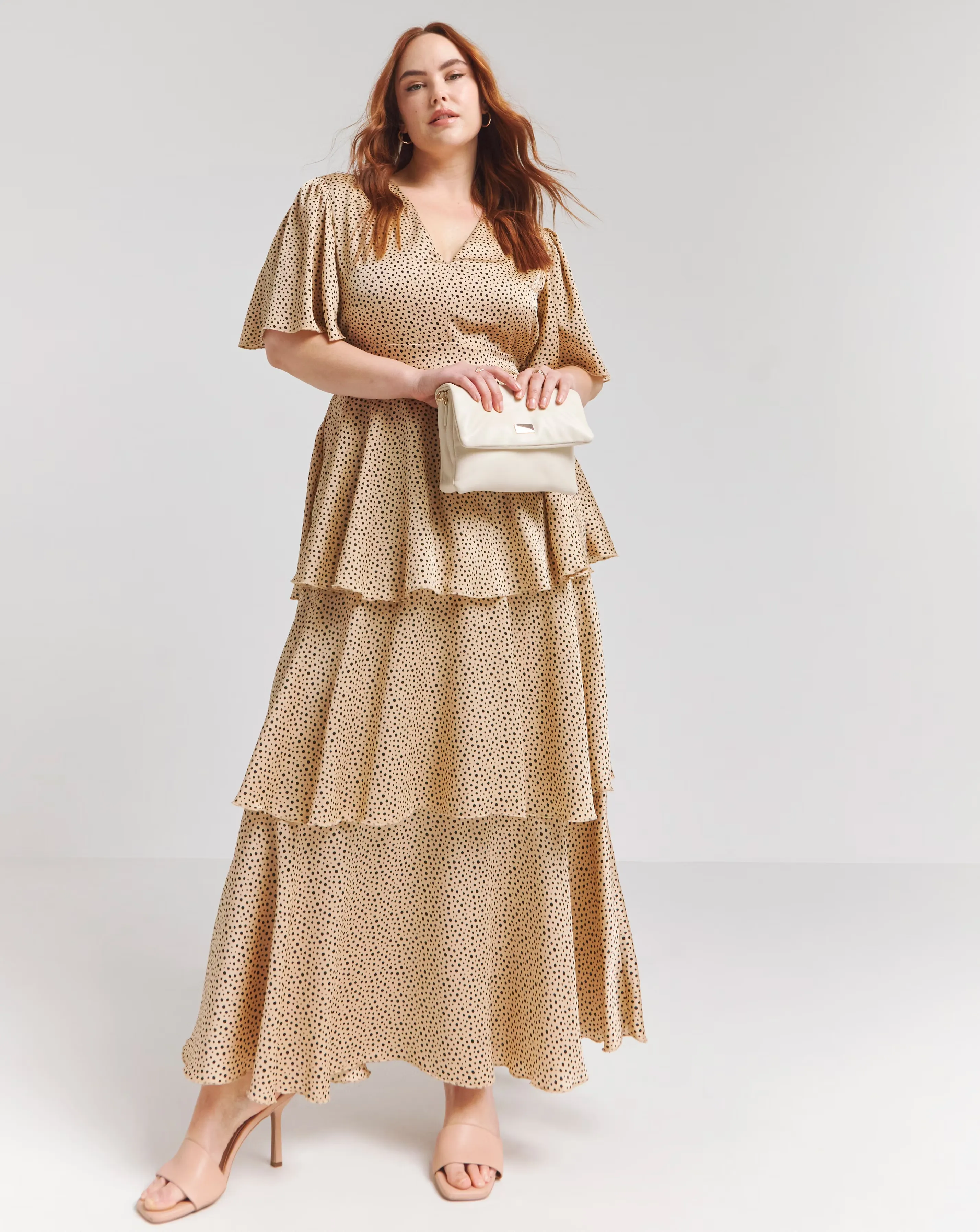 119249-flounce-london-camel-black-spot-satin-tiered-maxi-dress-1.webp
