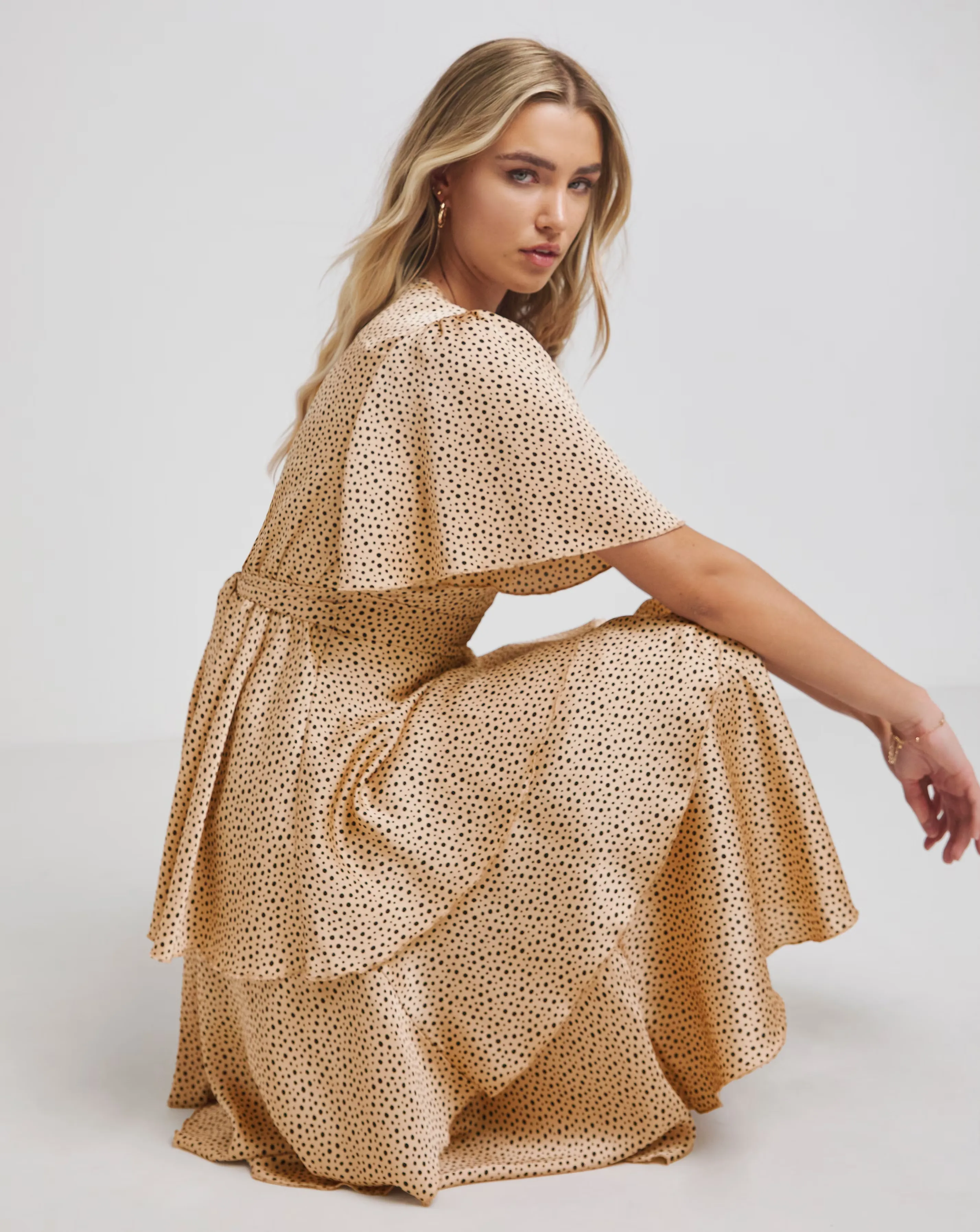 119249-flounce-london-camel-black-spot-satin-tiered-maxi-dress-1.webp