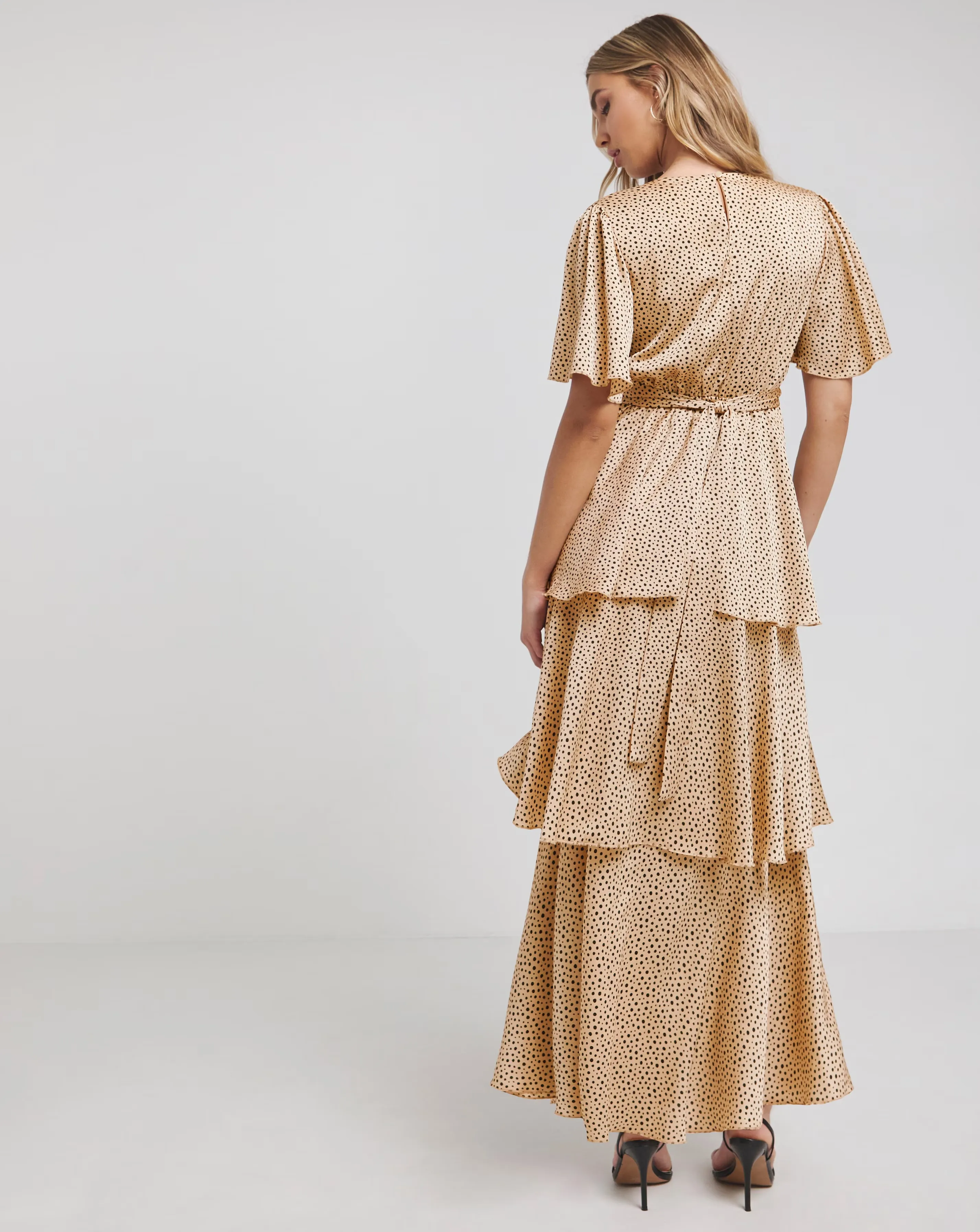 119249-flounce-london-camel-black-spot-satin-tiered-maxi-dress-1.webp