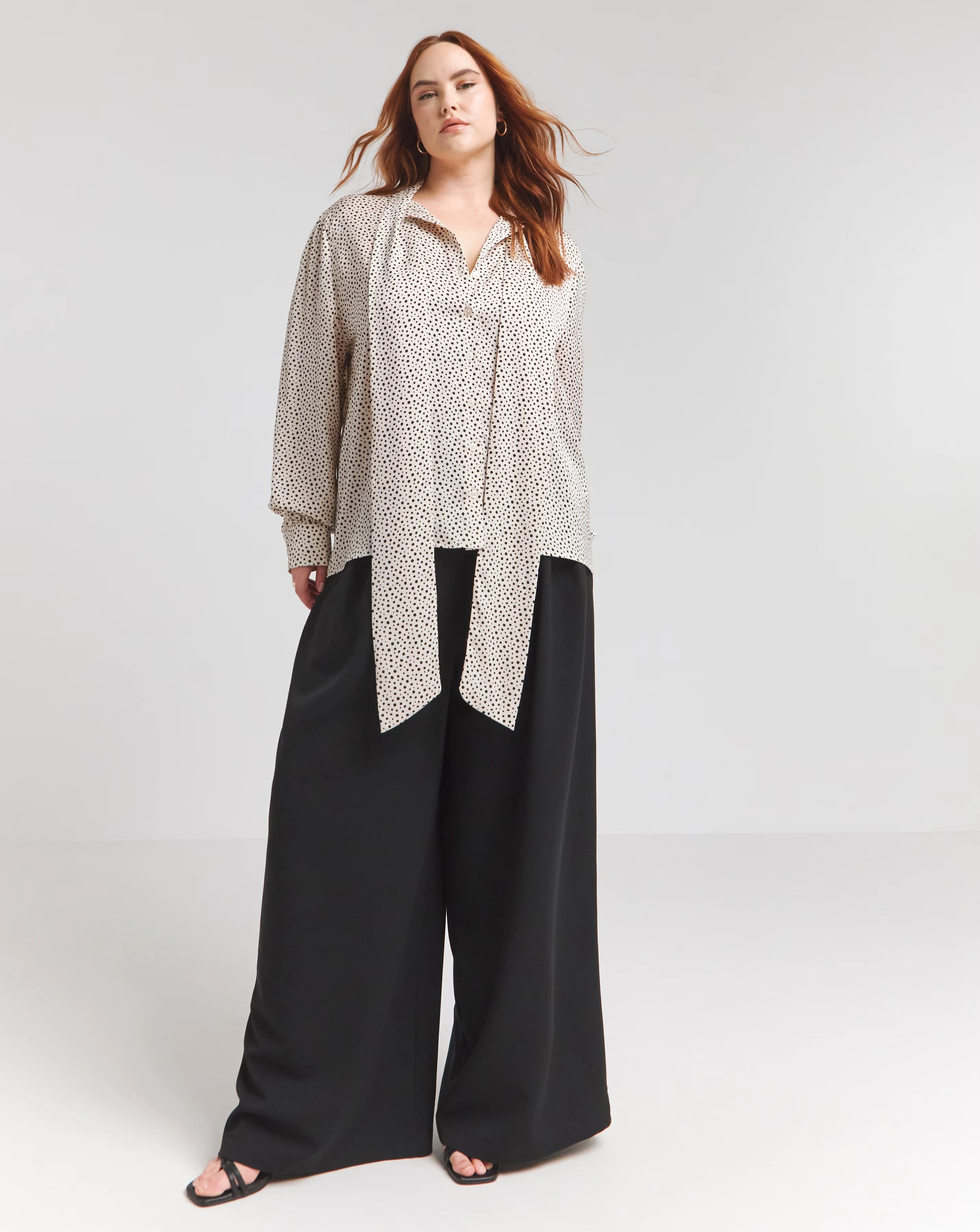 119318-flounce-london-off-white-black-spot-satin-tie-neck-blouse-1.webp
