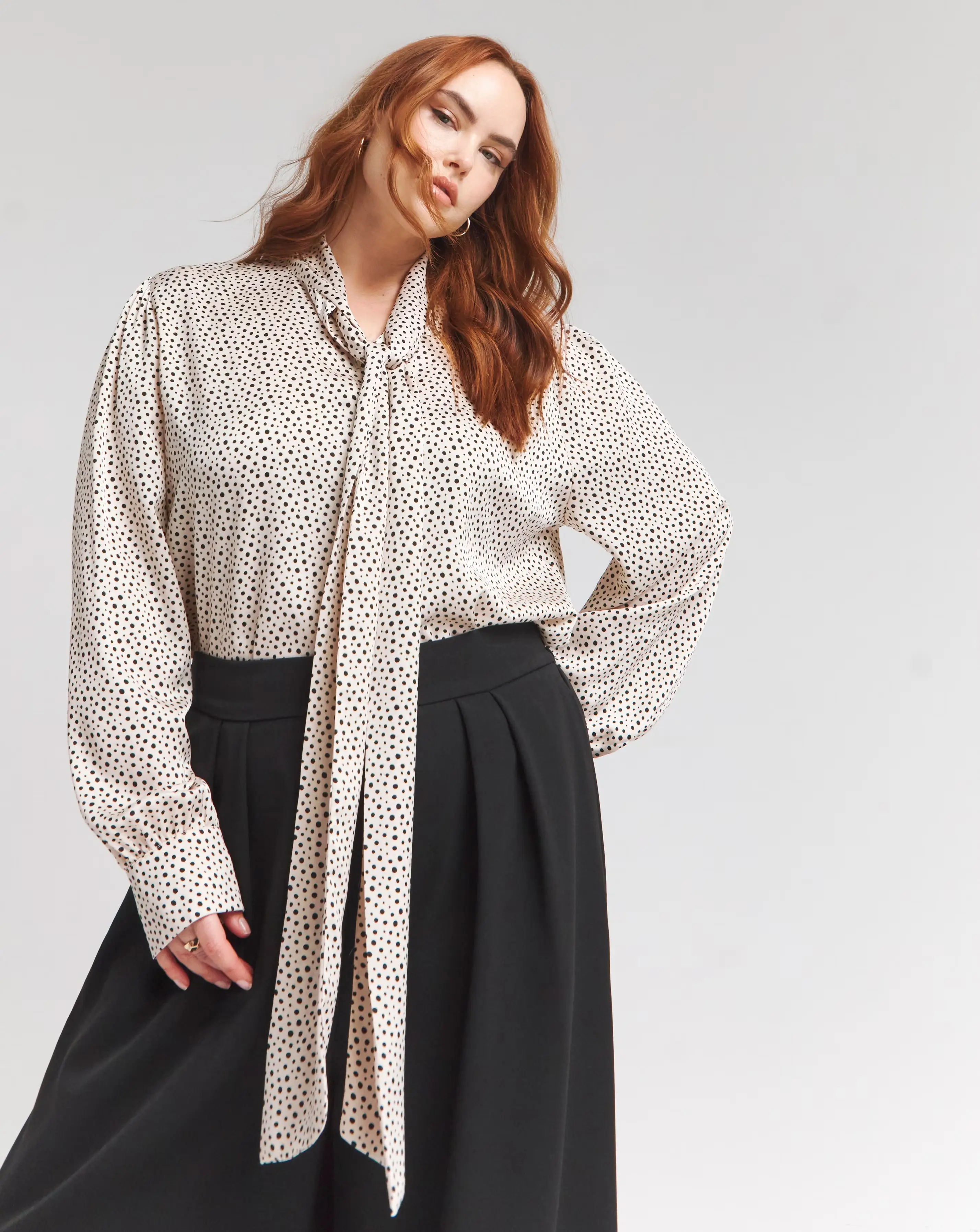 119318-flounce-london-off-white-black-spot-satin-tie-neck-blouse-1.webp