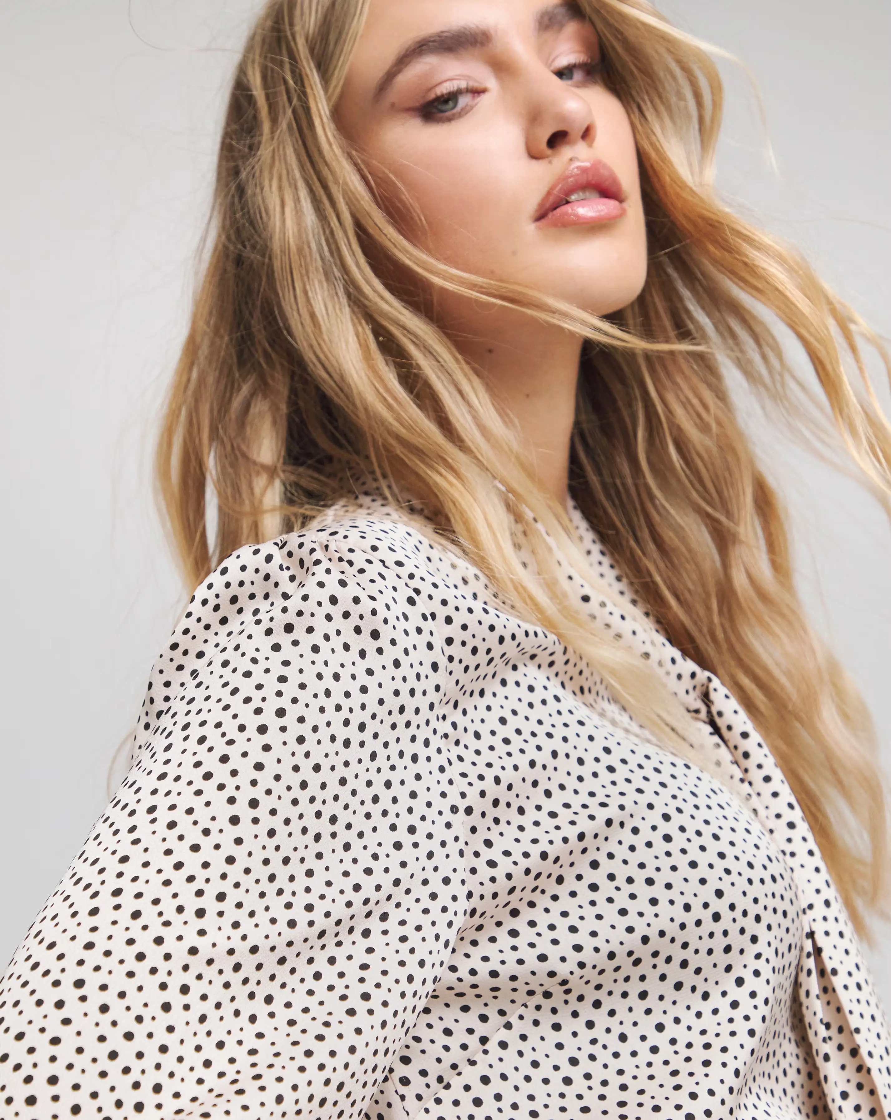 119318-flounce-london-off-white-black-spot-satin-tie-neck-blouse-1.webp