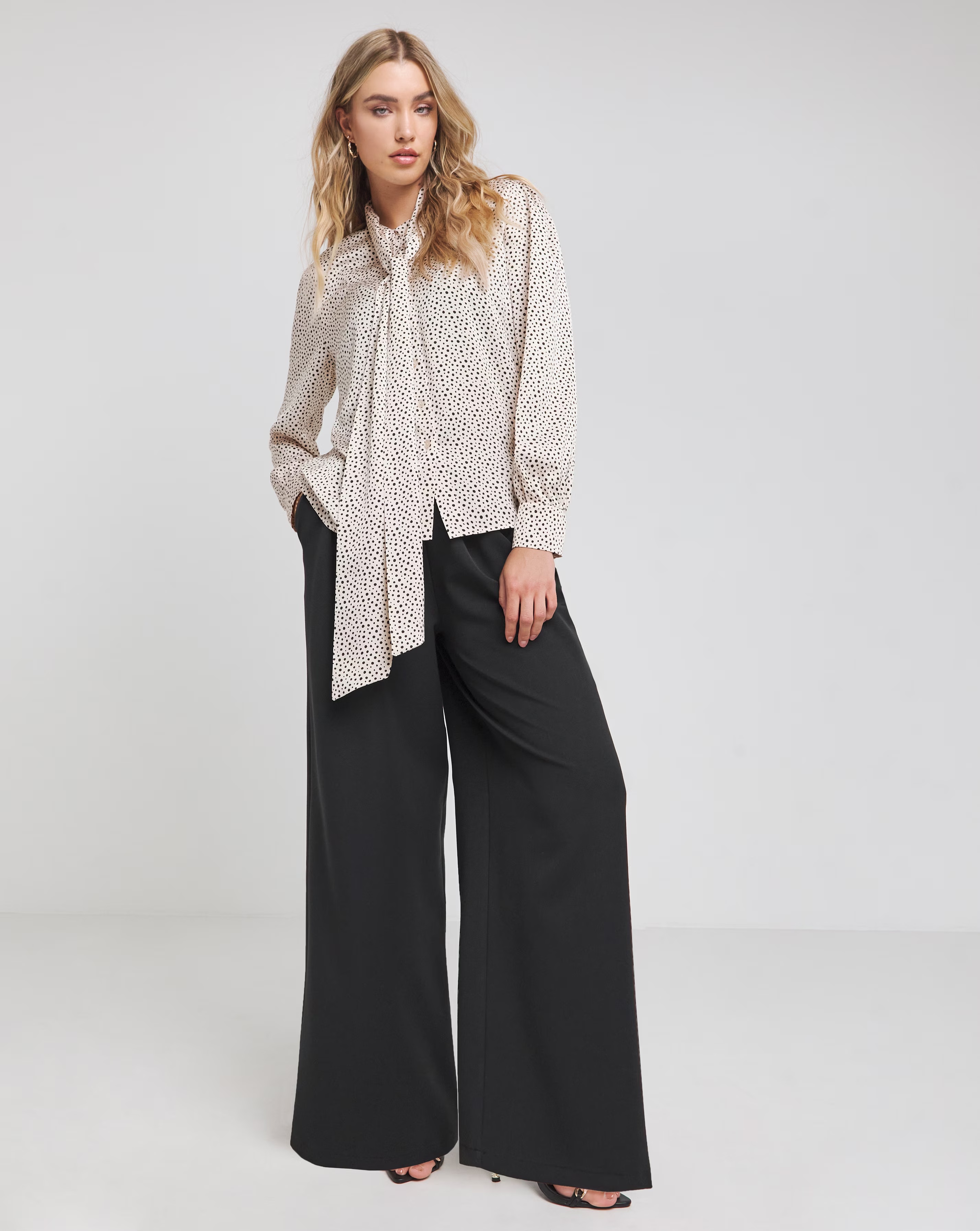 119318-flounce-london-off-white-black-spot-satin-tie-neck-blouse-1.webp