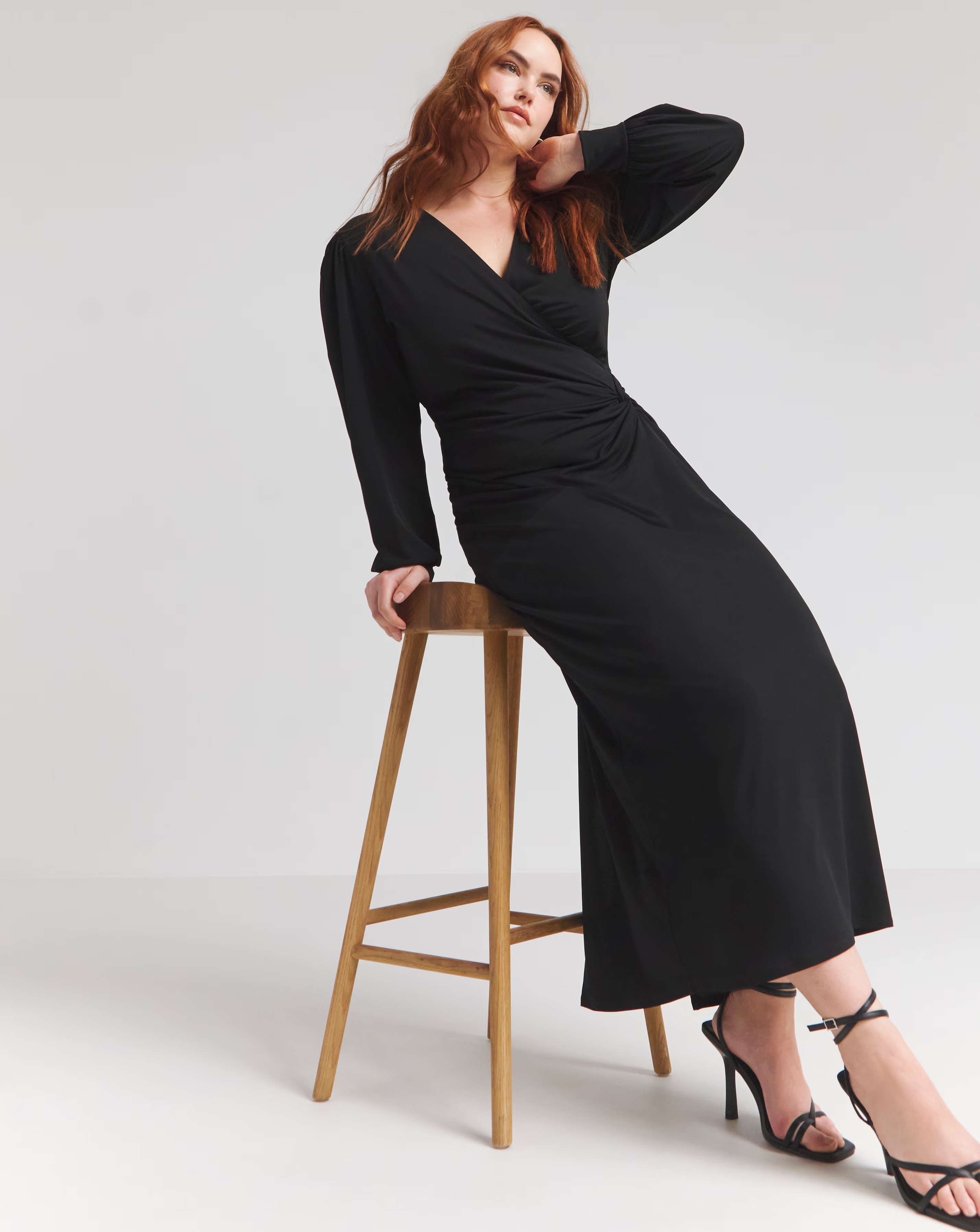 119337-flounce-london-black-slinky-jersey-twist-knot-maxi-dress-1.webp