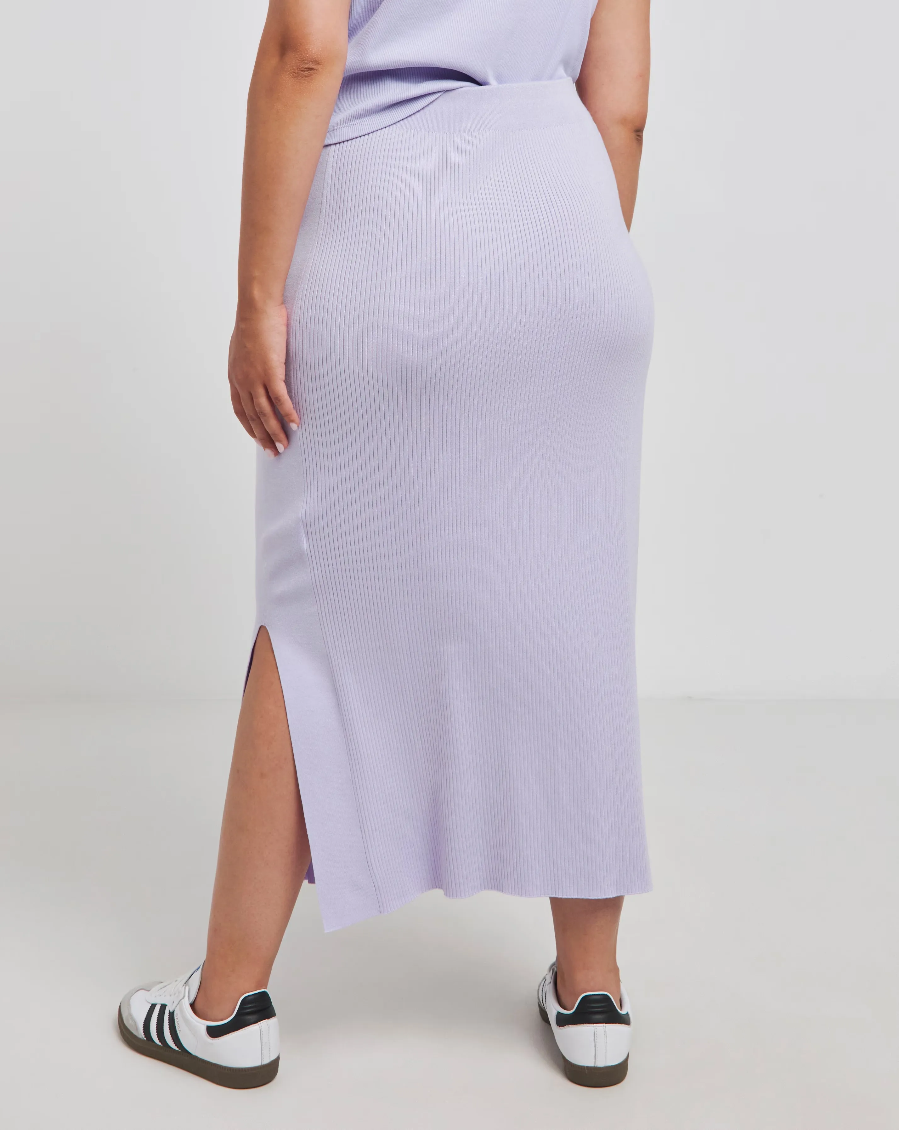 119442-calvin-klein-jeans-woven-label-sweater-skirt-1.jpg