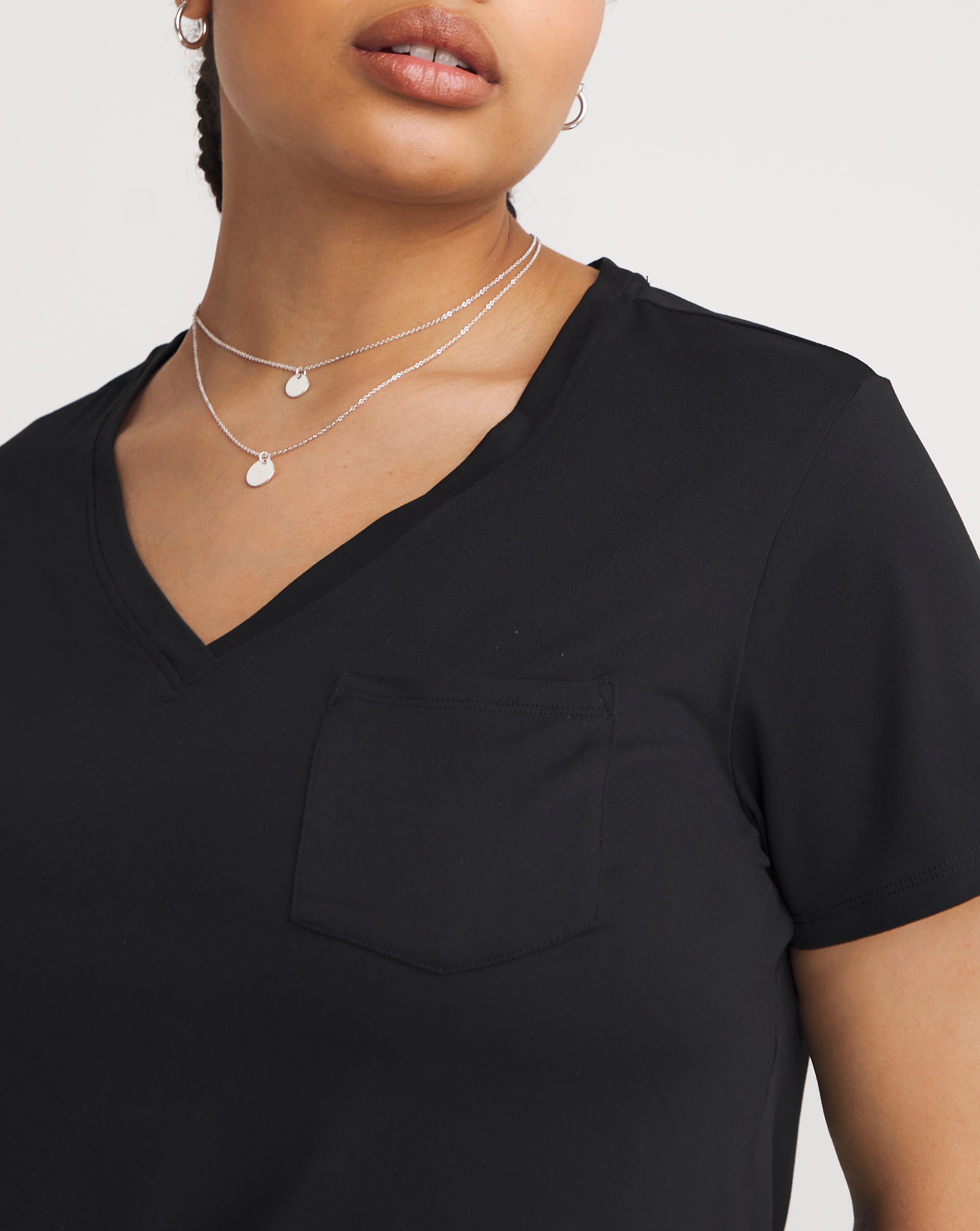 123238-skechers-godri-serene-v-neck-t-shirt-1.jpg