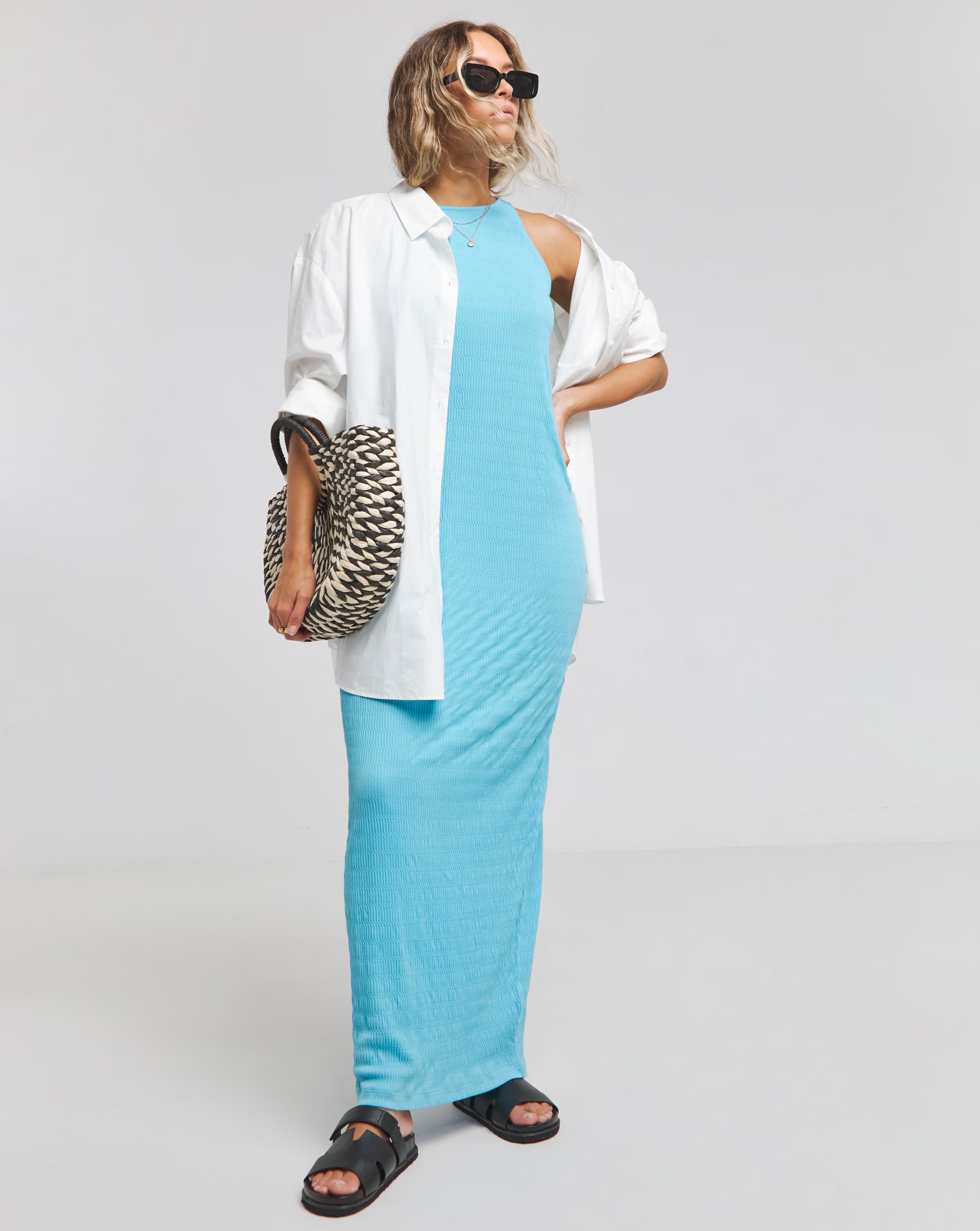 127189-blue-textured-jersey-racer-maxi-dress-1.webp
