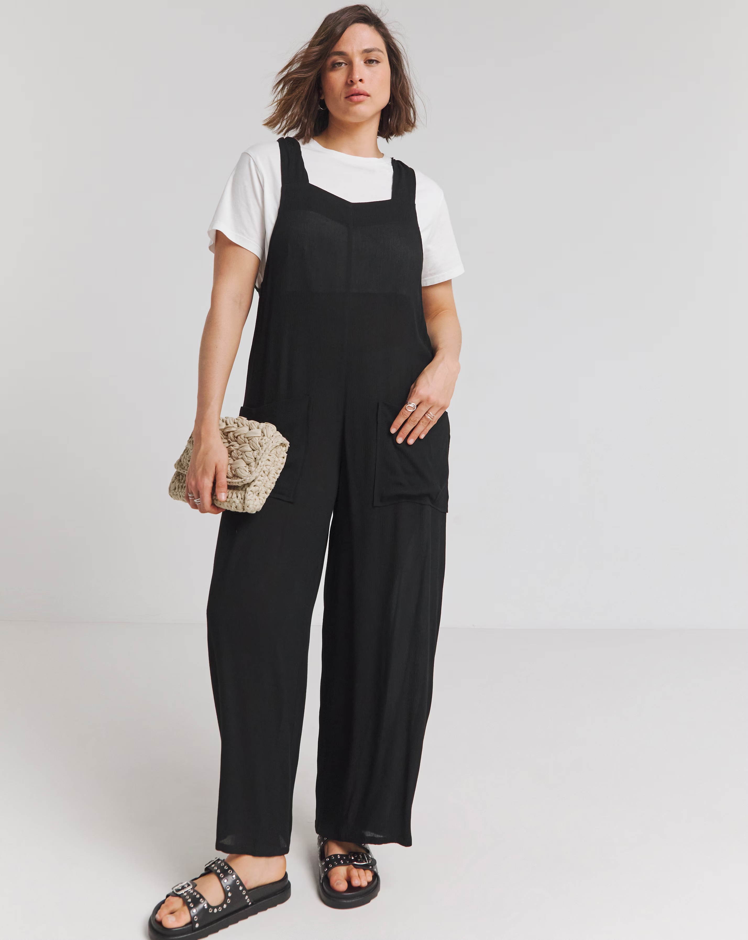 127228-simply-be-black-crinkle-wide-leg-jumpsuit-with-pockets-1.jpg