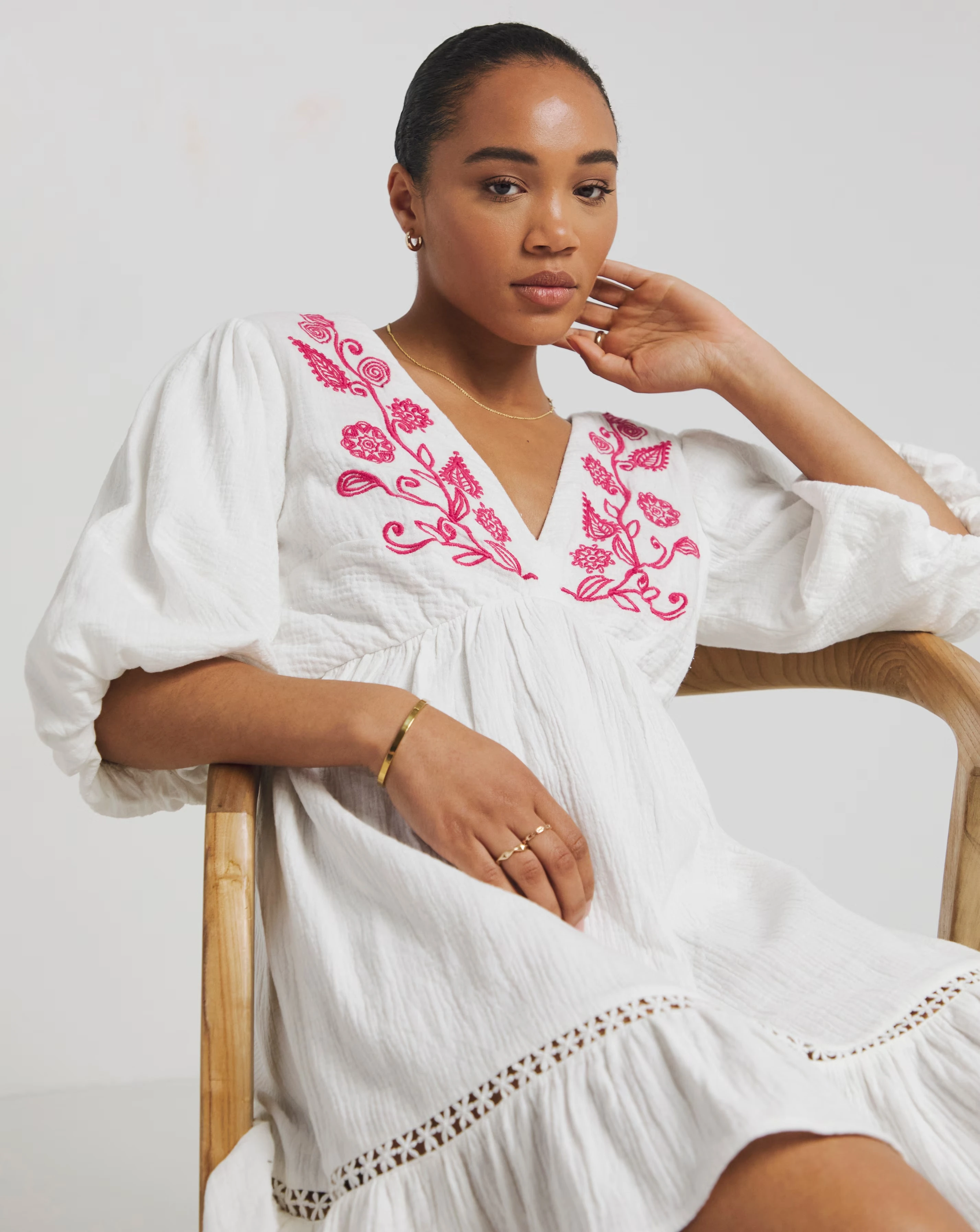 127371-white-and-pink-embroidered-smock-dress-1.webp