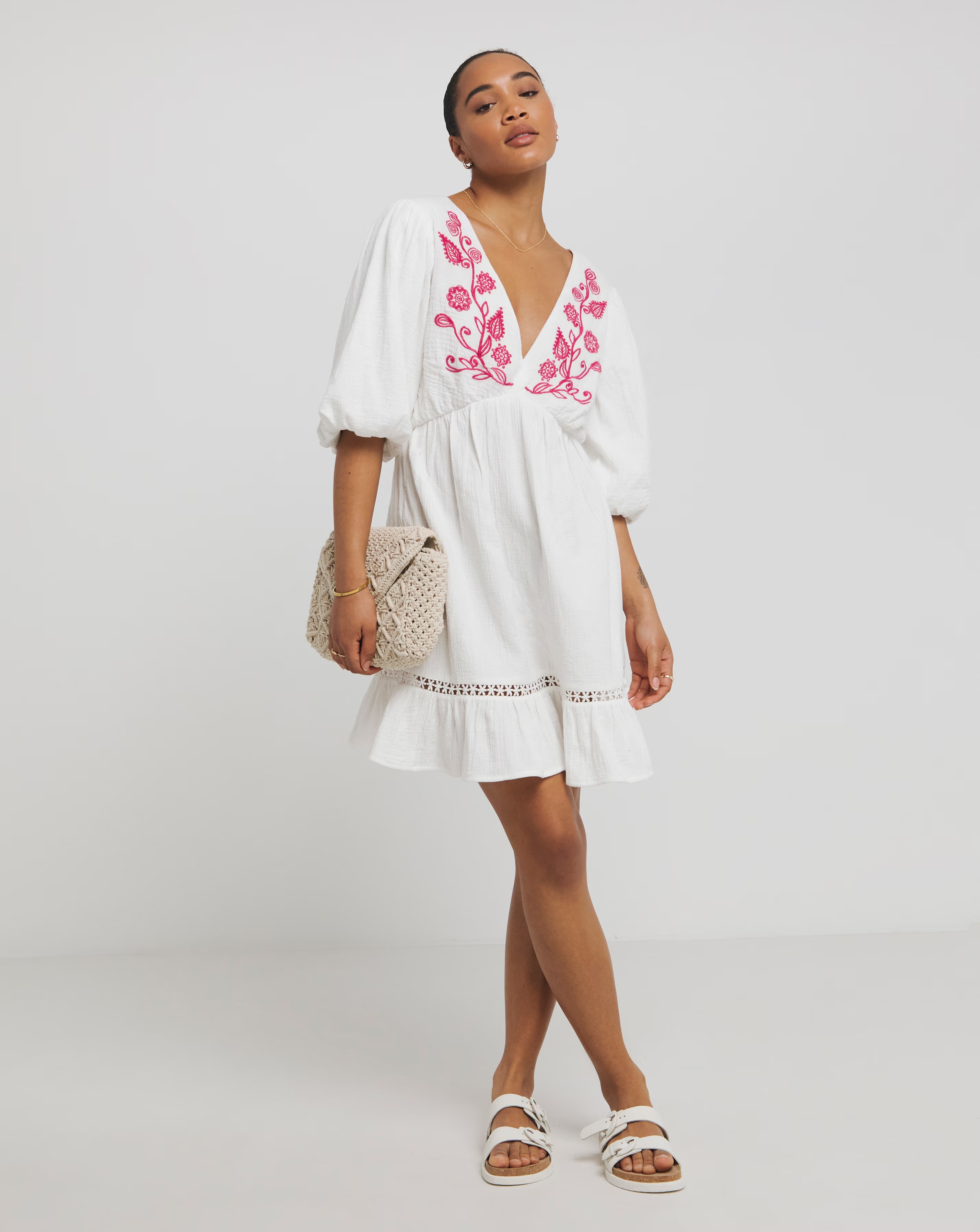 127371-white-and-pink-embroidered-smock-dress-1.webp