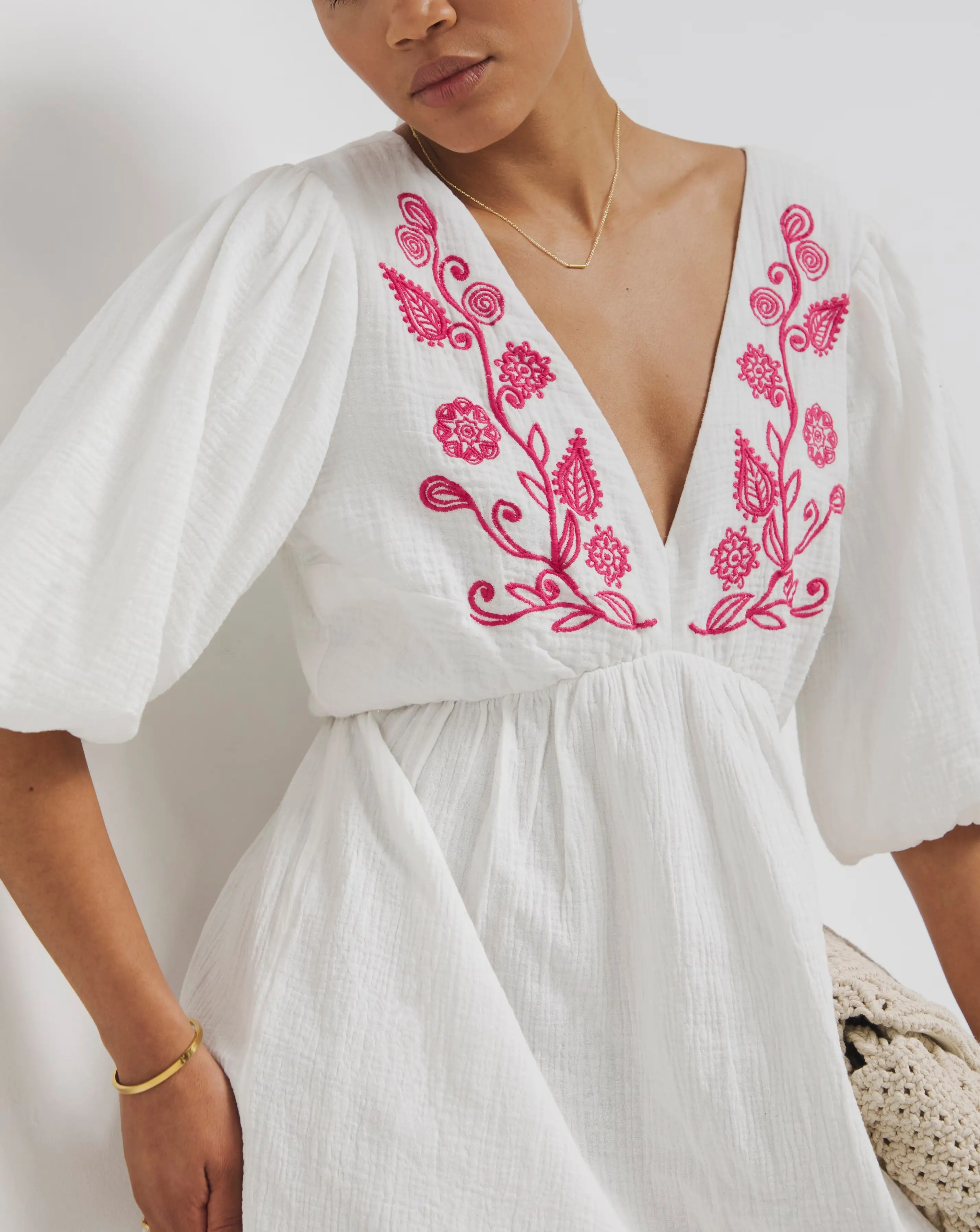 127371-white-and-pink-embroidered-smock-dress-1.webp