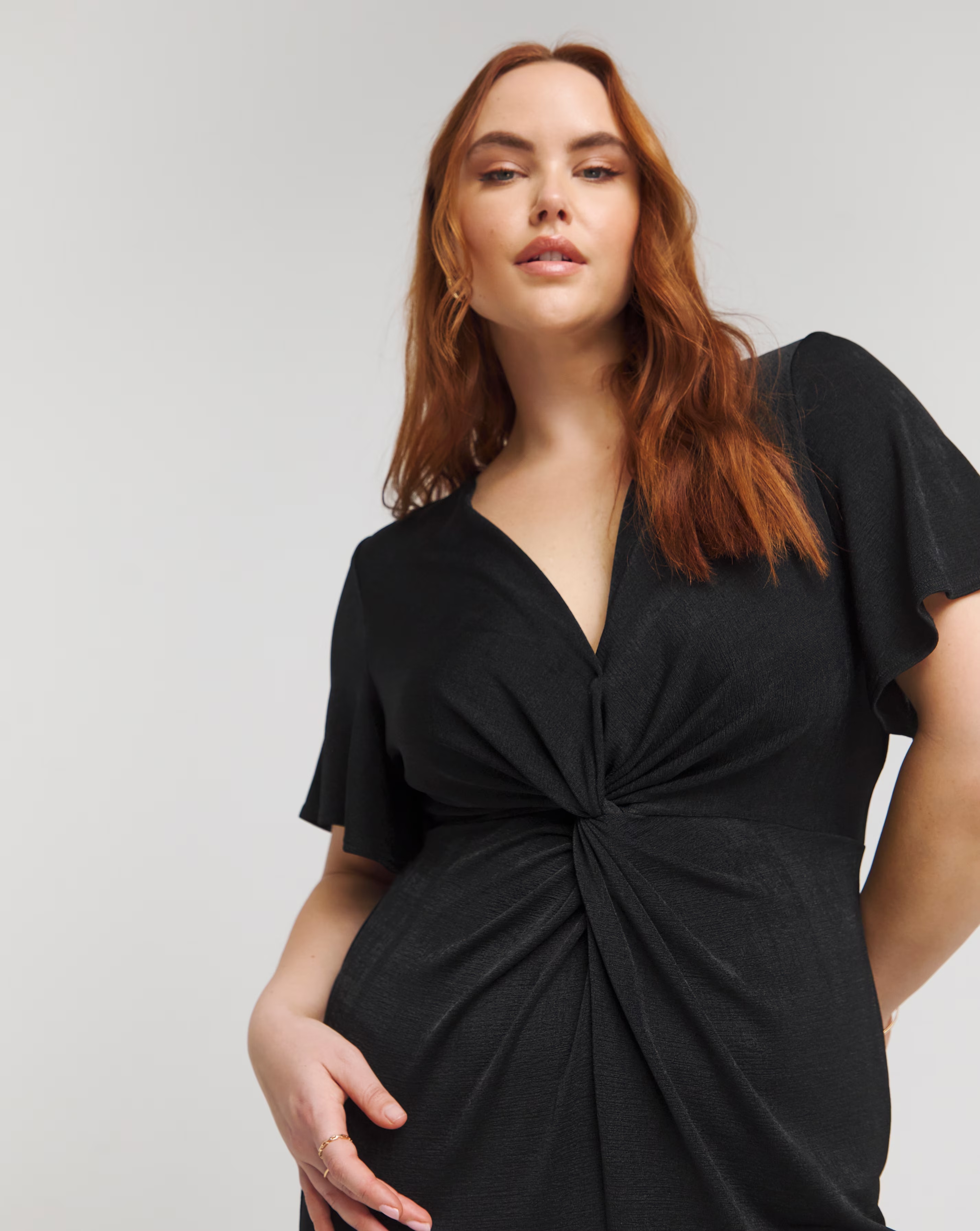 127474-black-slinky-short-sleeve-knot-front-midaxi-dress-1.jpg