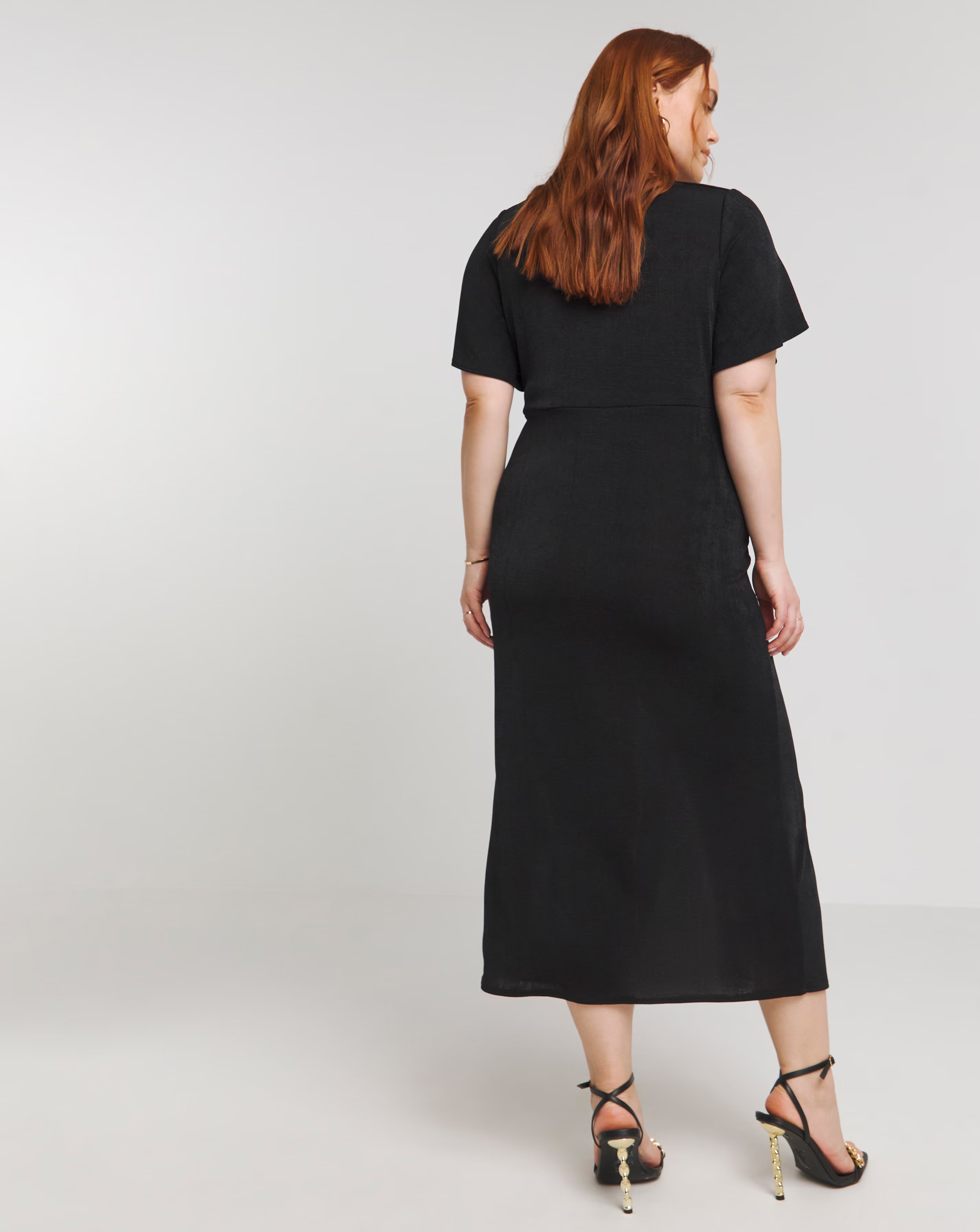 127474-black-slinky-short-sleeve-knot-front-midaxi-dress-1.jpg