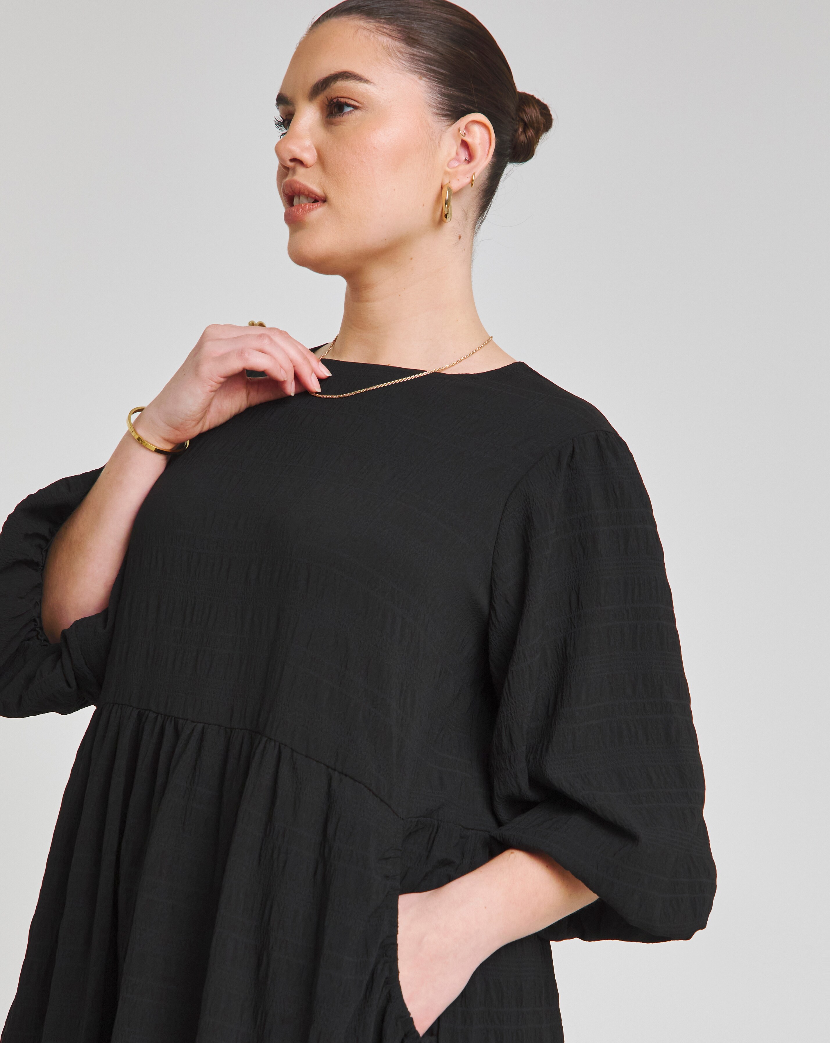 127913-black-textured-tiered-midi-dress-with-pockets-1.jpg