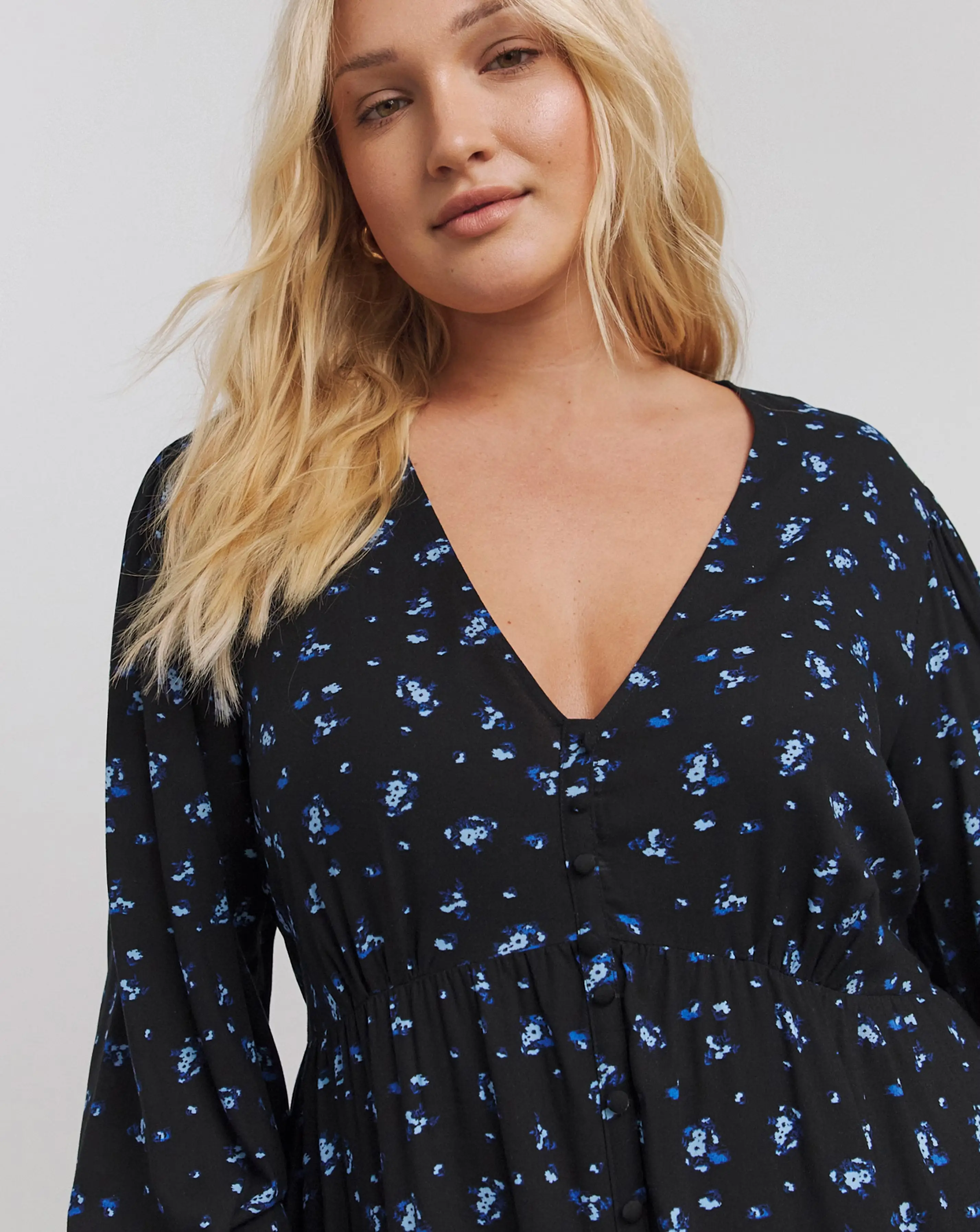 128286-blue-print-button-through-v-neck-midi-dress-1.webp