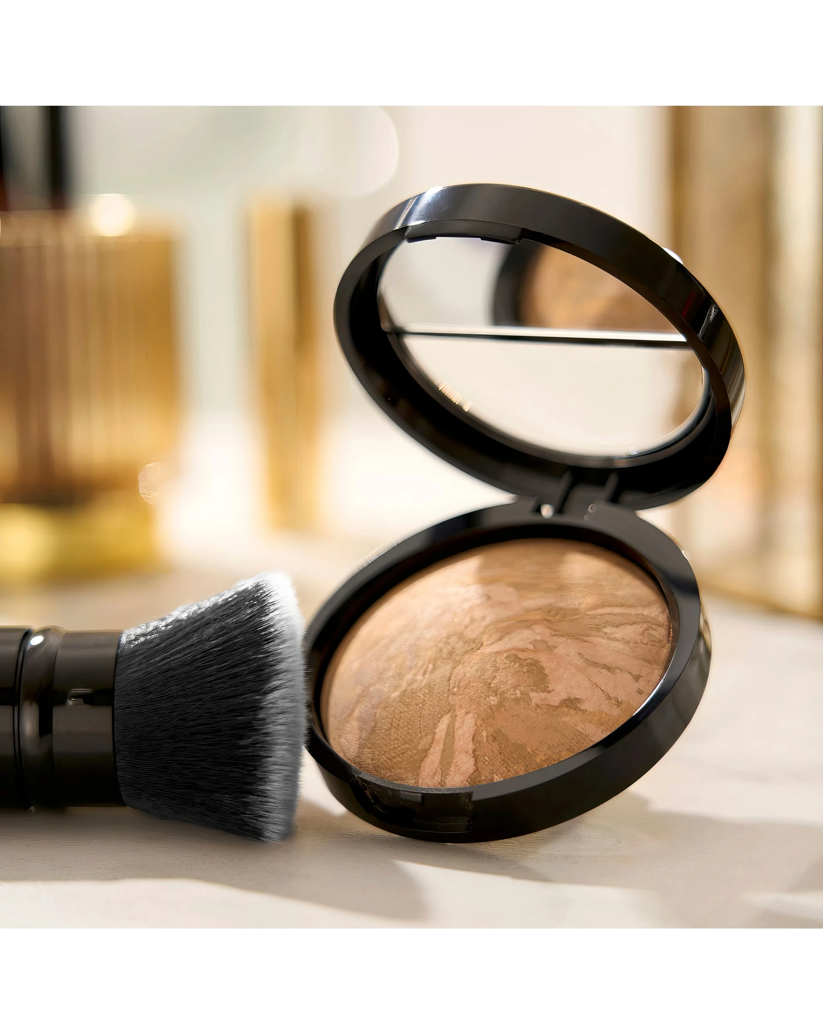 128457-laura-geller-baked-balance-n-glow-illuminating-foundation-medium-1.jpg