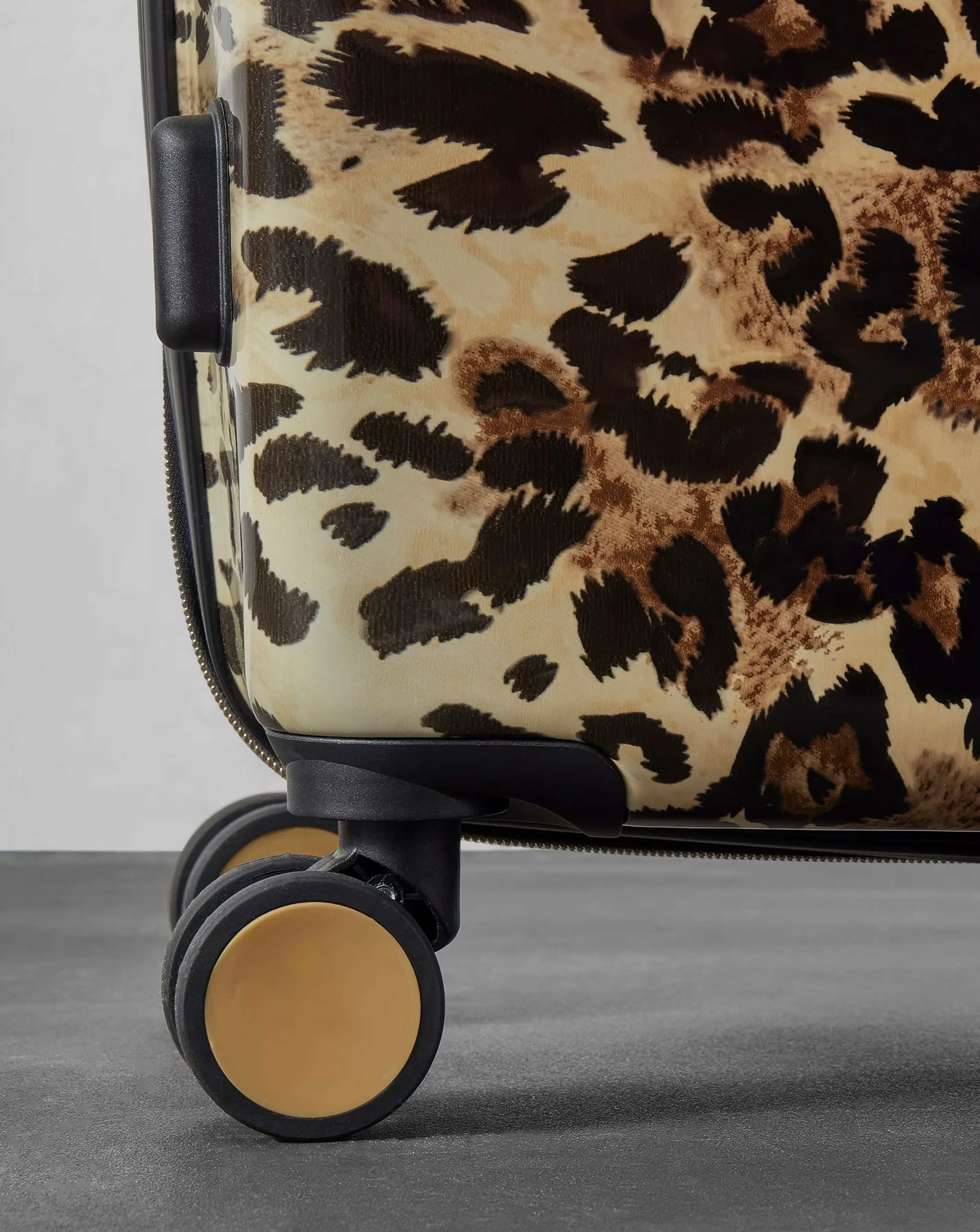 128669-rock-savannah-leopard-cabin-suitcase-1.jpg