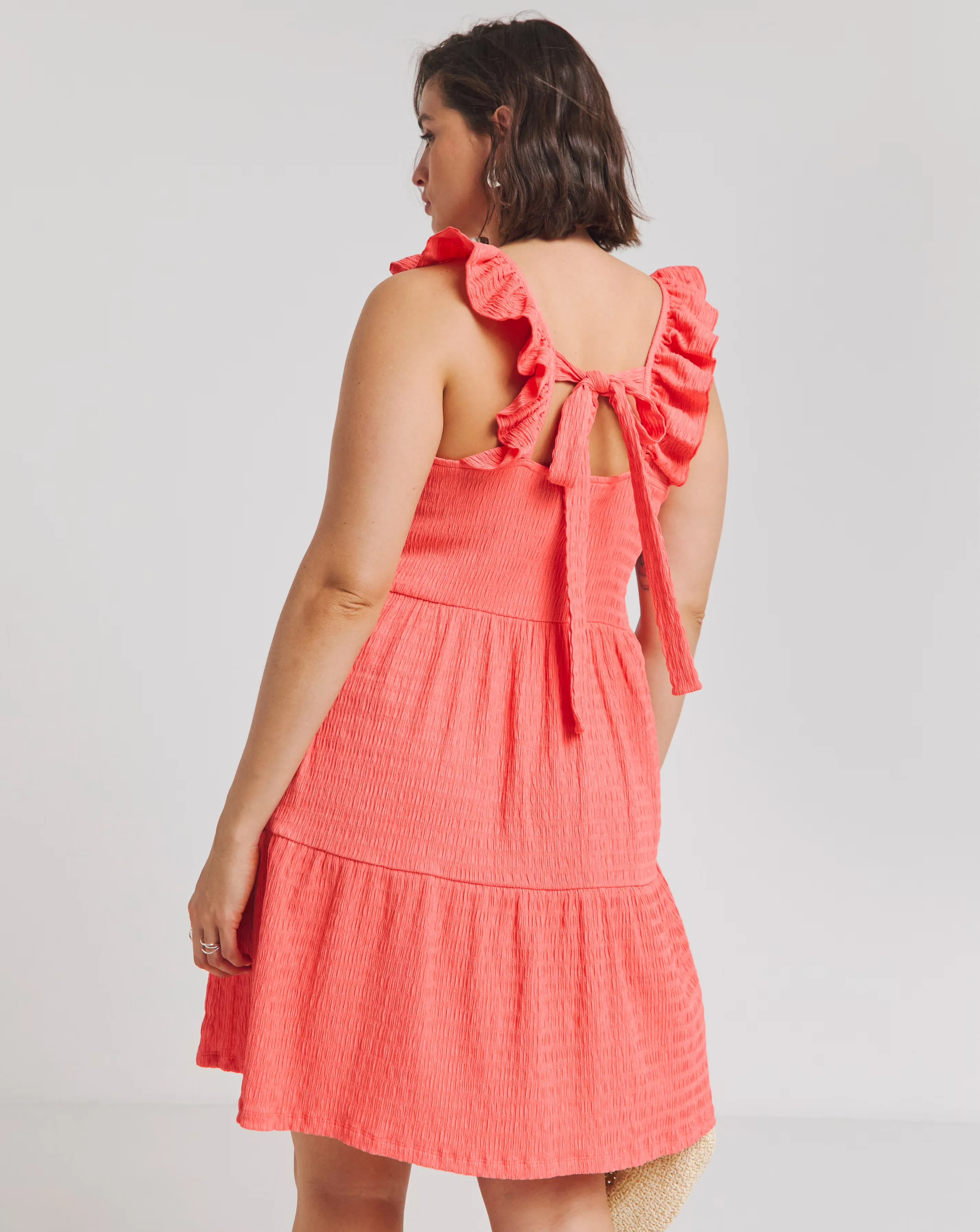 129357-simply-be-coral-textured-jersey-smock-dress-1.webp