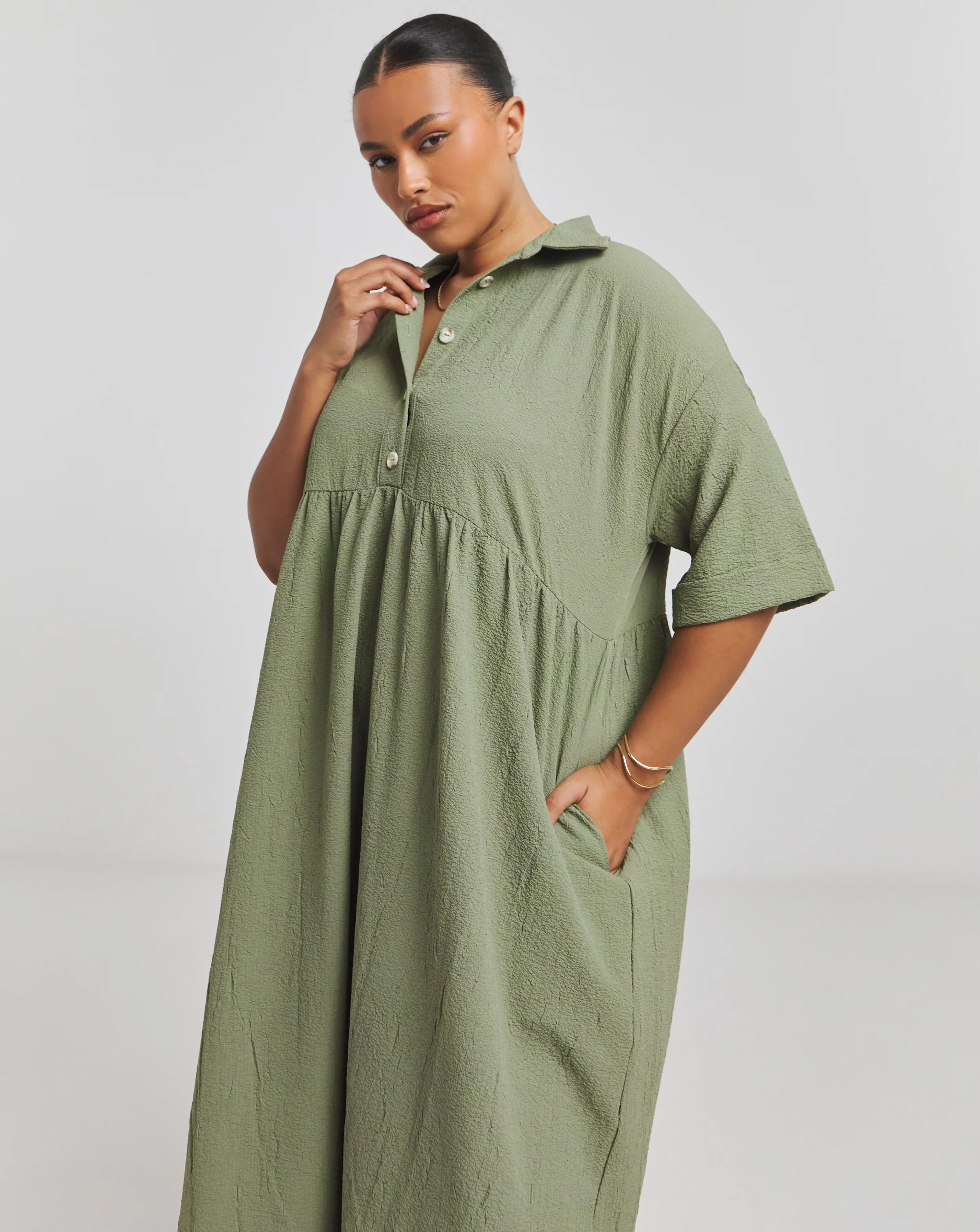130340-khaki-utility-midi-shirt-dress-with-pockets-1.webp