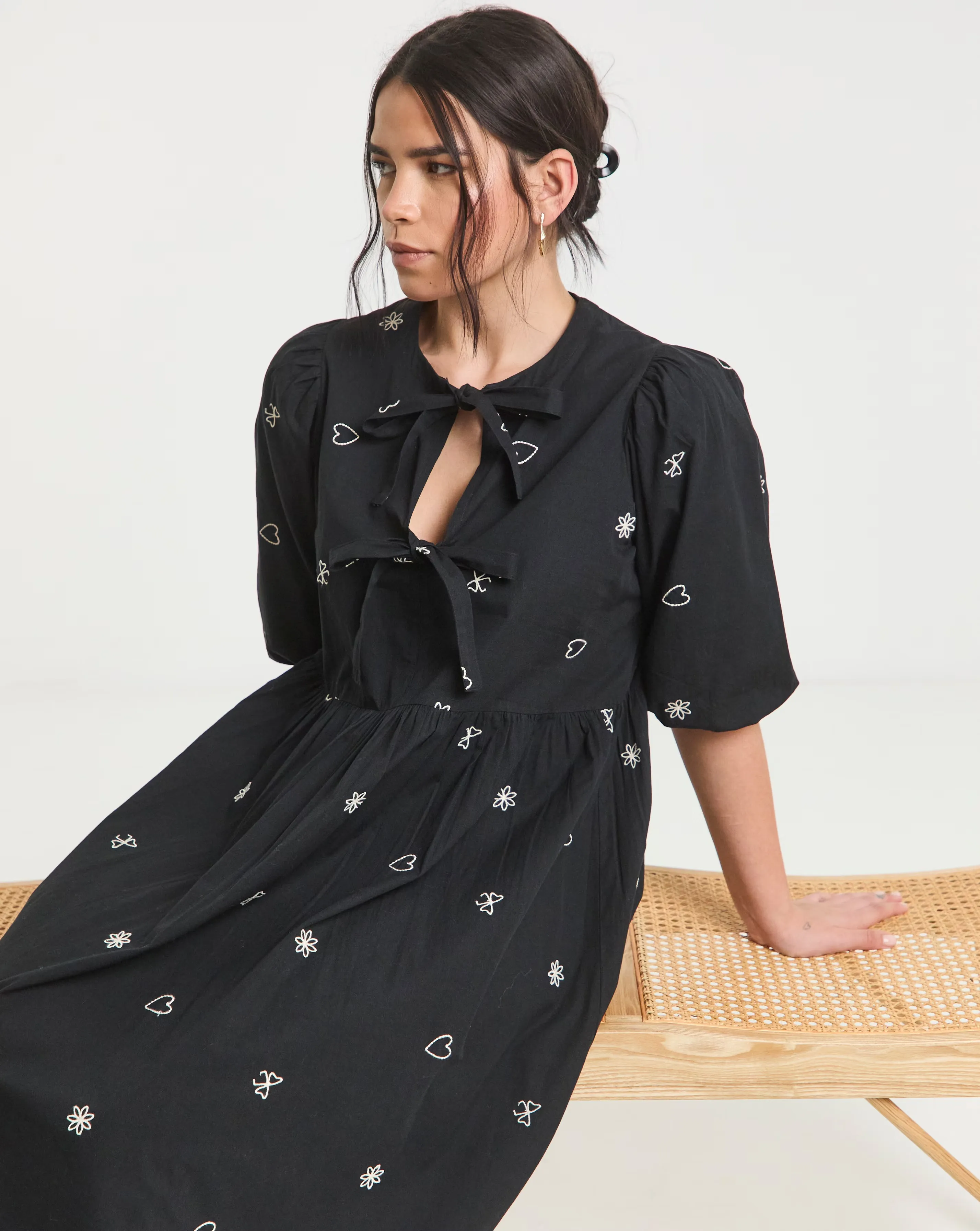 130610-black-embroidered-bow-front-midi-dress-1.jpg