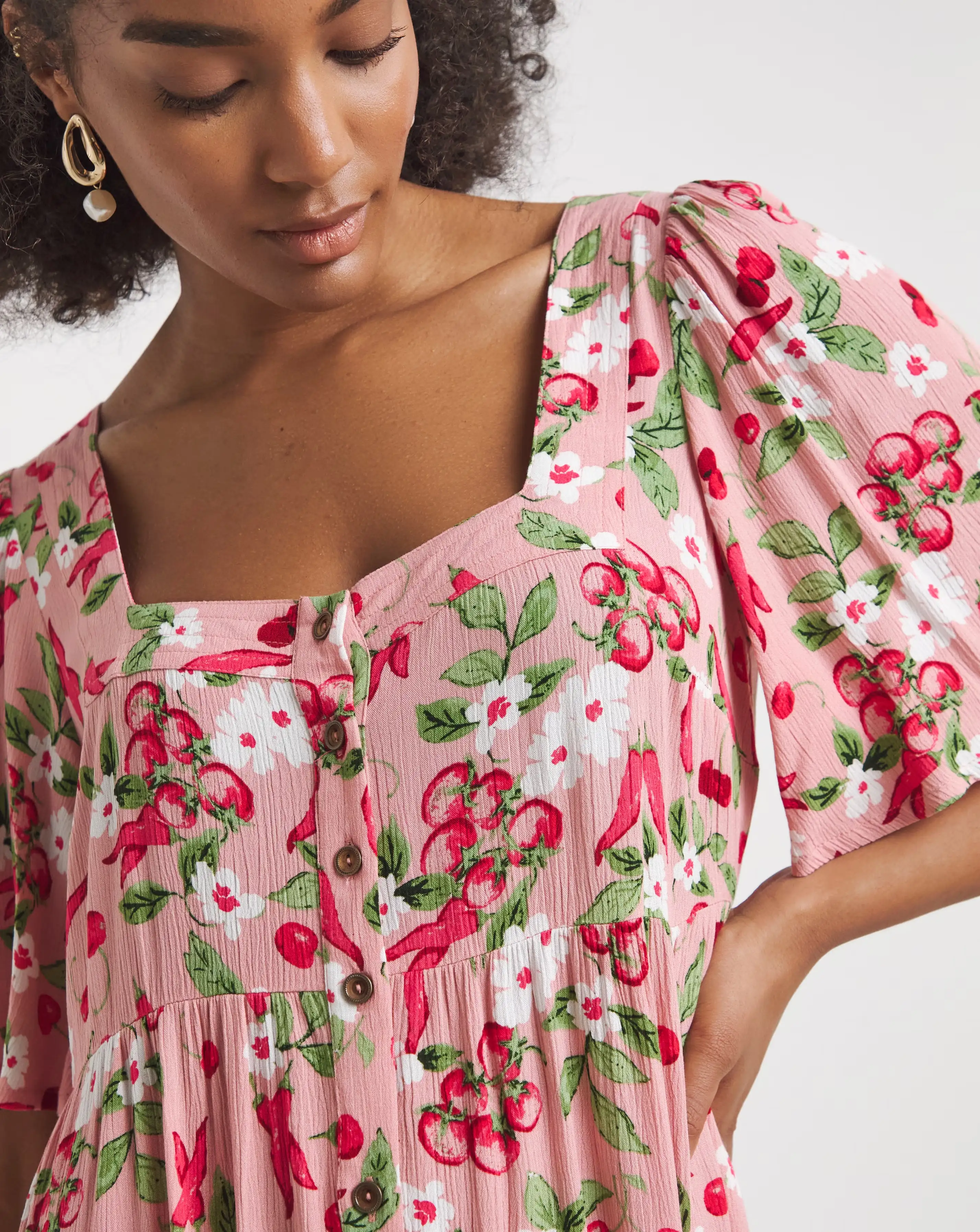 131620-simply-be-pink-print-crinkle-button-through-maxi-dress-1.webp