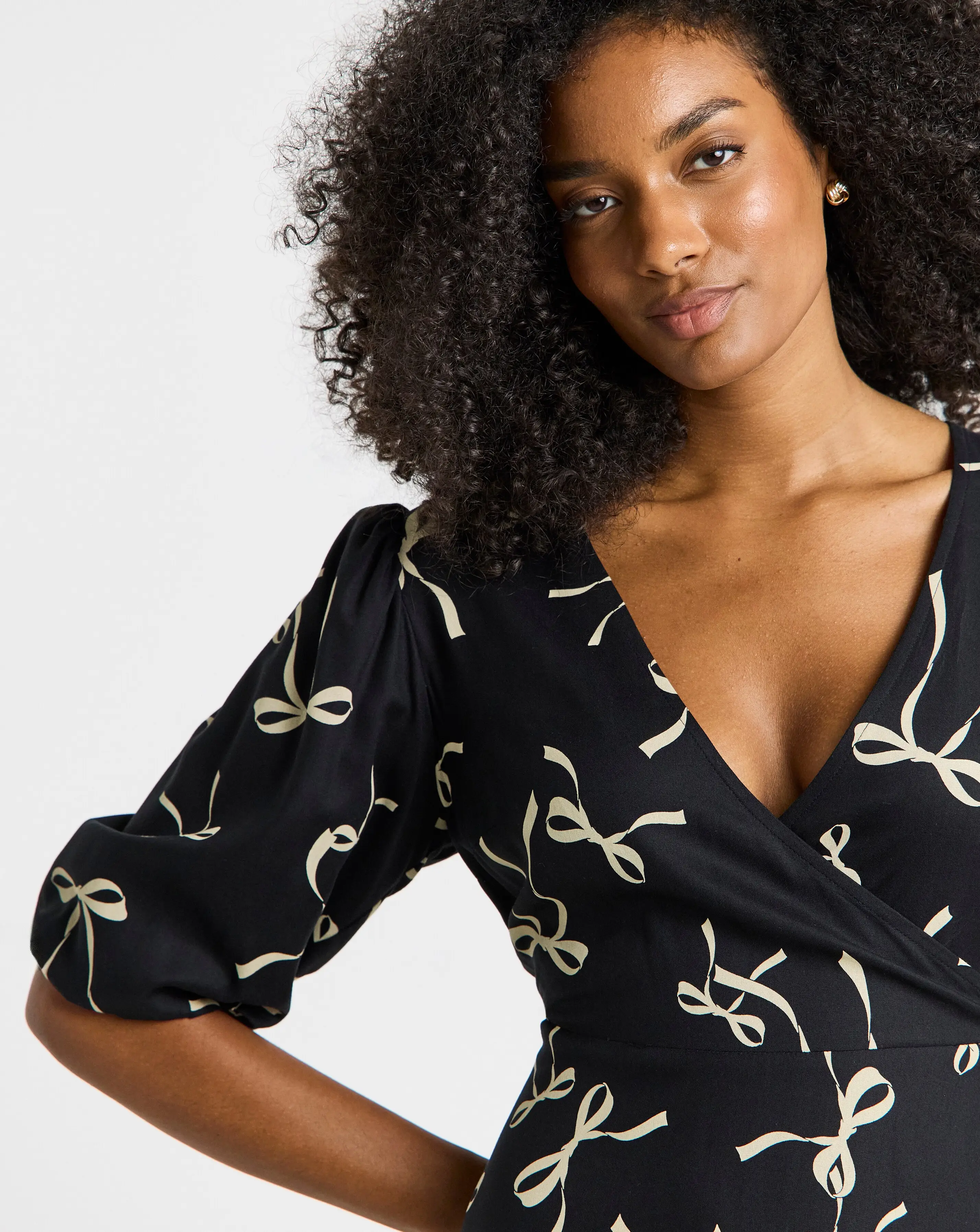 131865-simply-be-bow-print-viscose-wrap-midi-dress-1.webp
