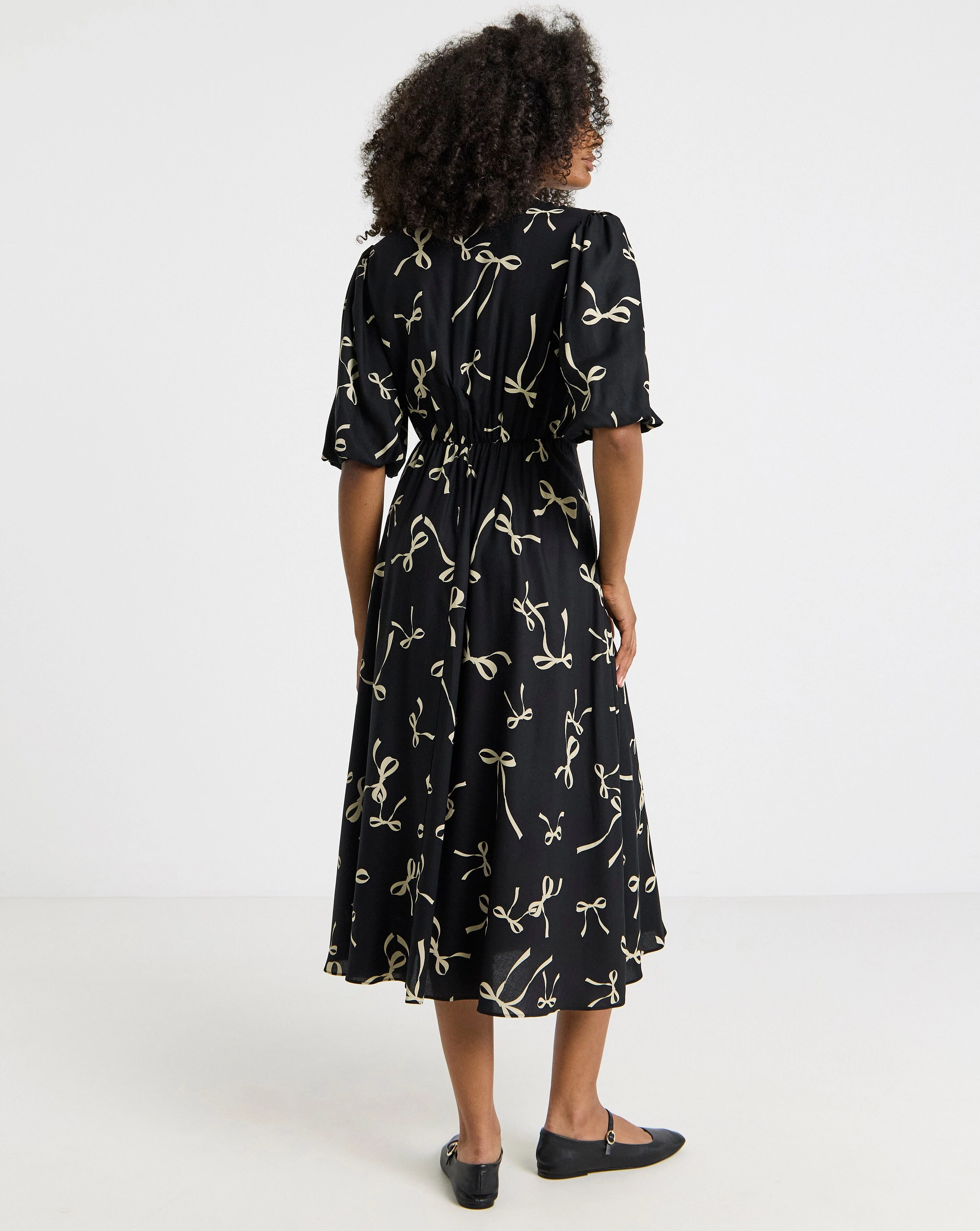 131865-simply-be-bow-print-viscose-wrap-midi-dress-1.webp