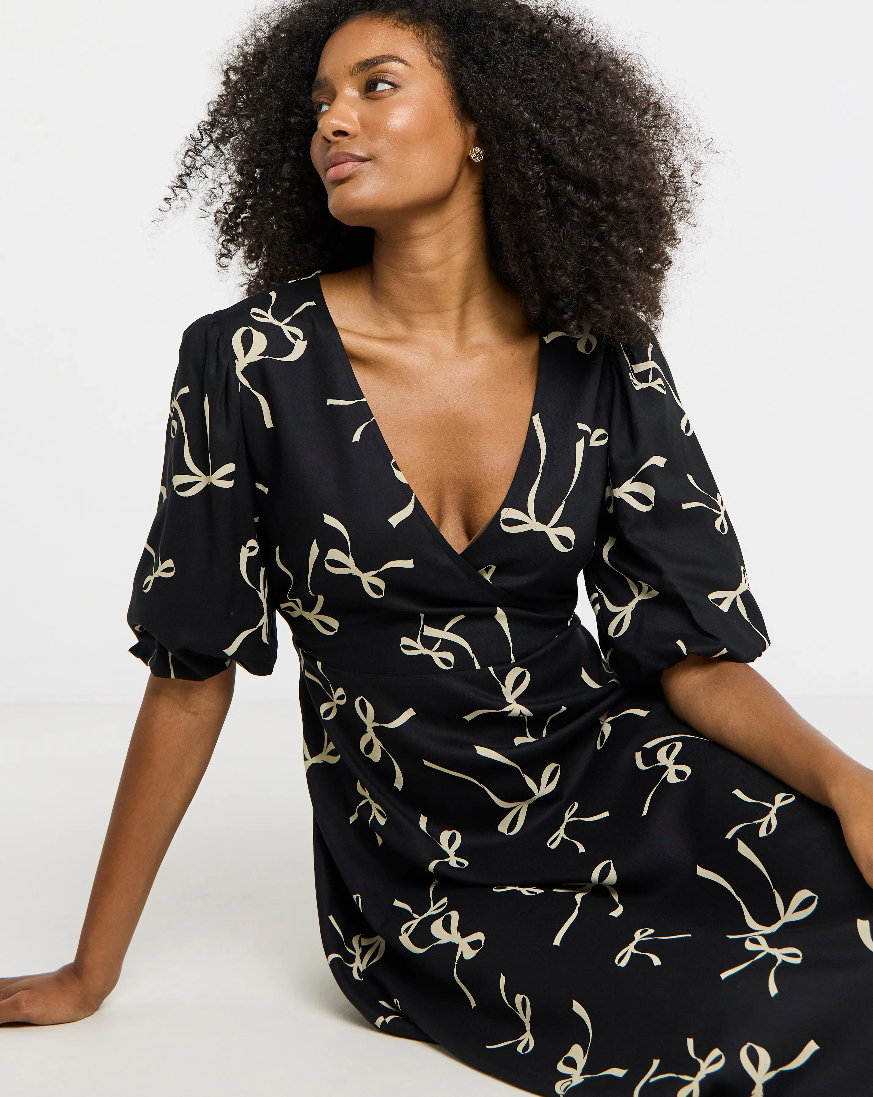 131865-simply-be-bow-print-viscose-wrap-midi-dress-1.webp