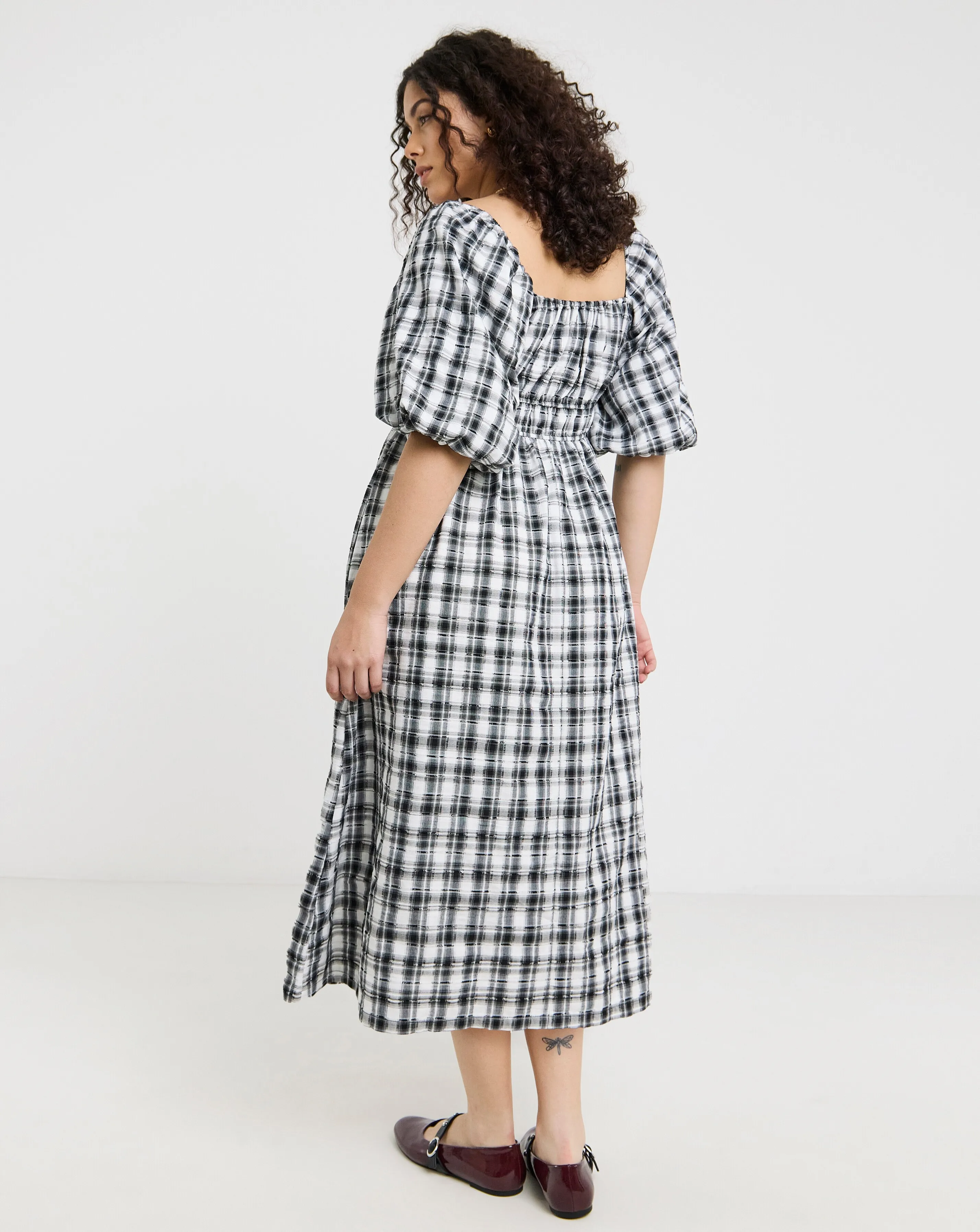 131968-simply-be-mono-check-midi-dress-with-shirred-bodice-1.webp