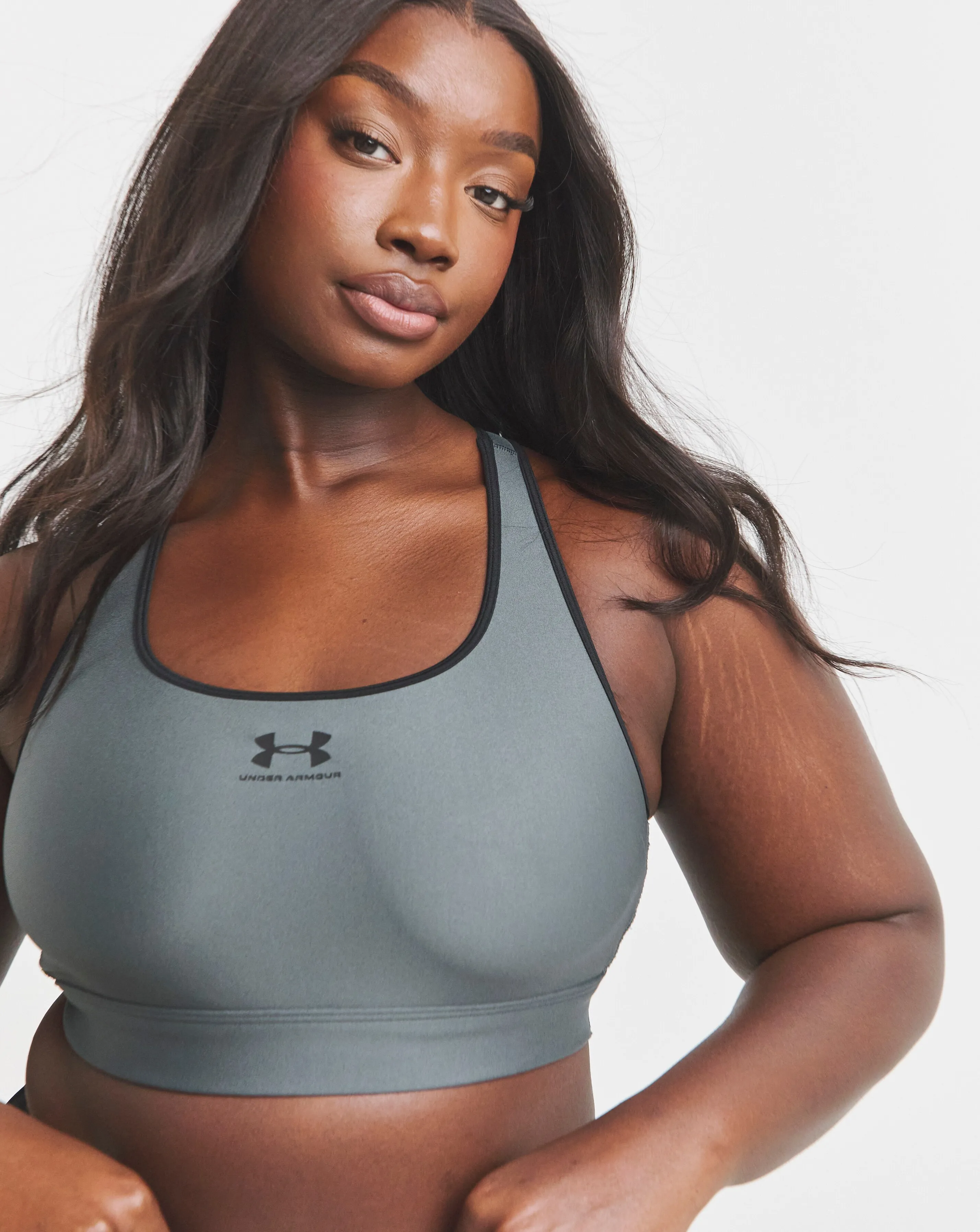 134005-under-armour-heatgear-mid-padless-bra-1.webp