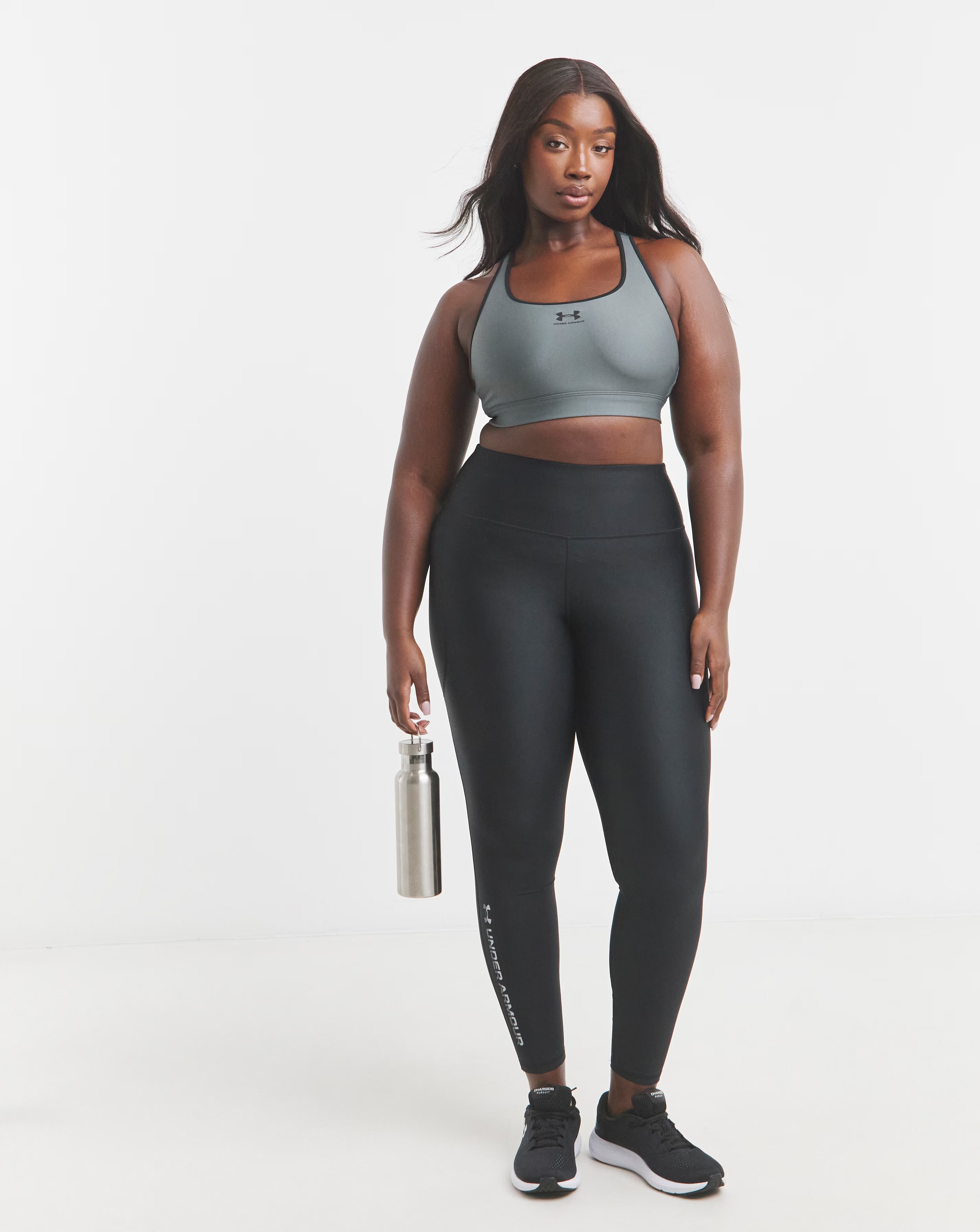 134005-under-armour-heatgear-mid-padless-bra-1.webp