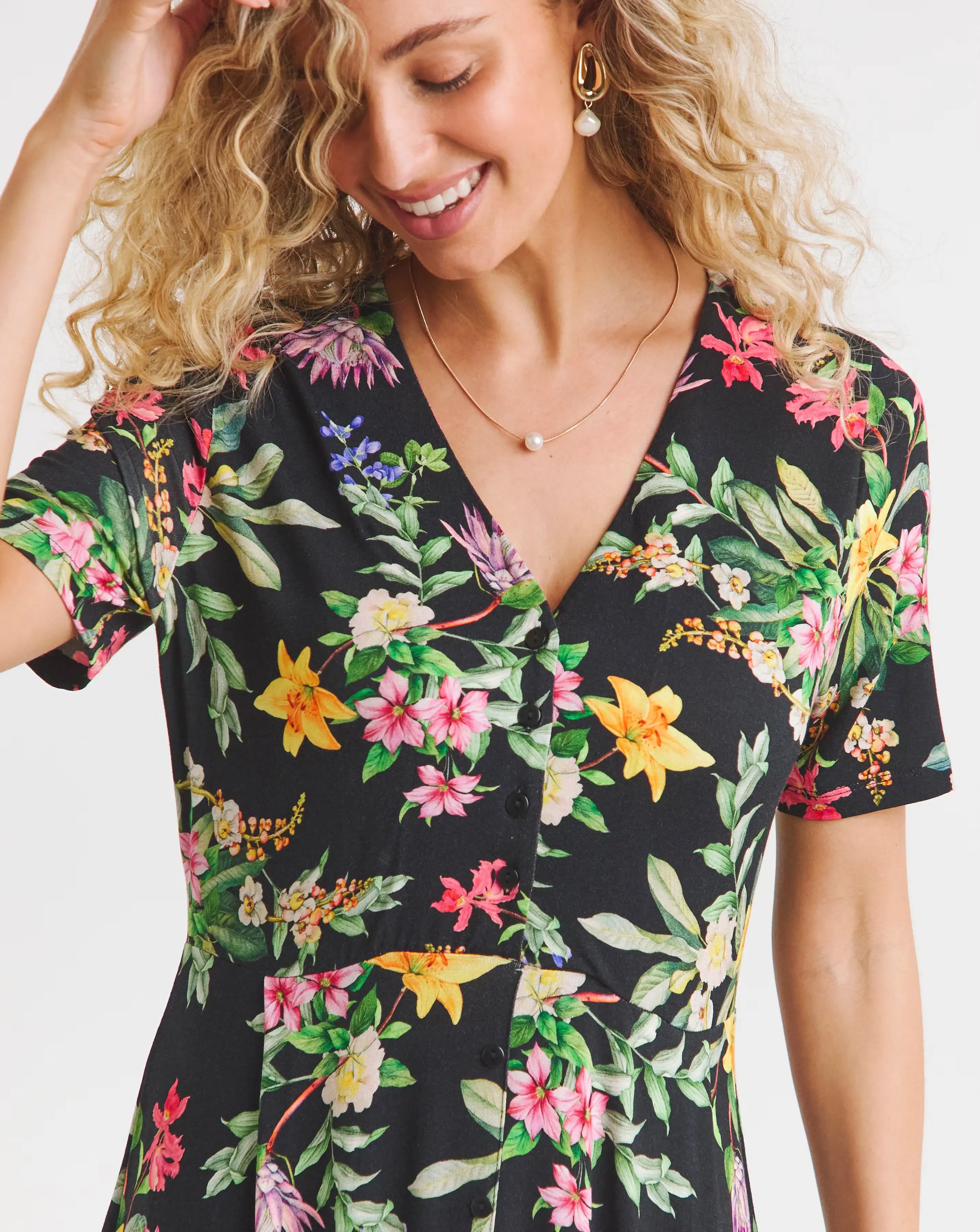 137531-joe-browns-floral-tea-dress-1.webp