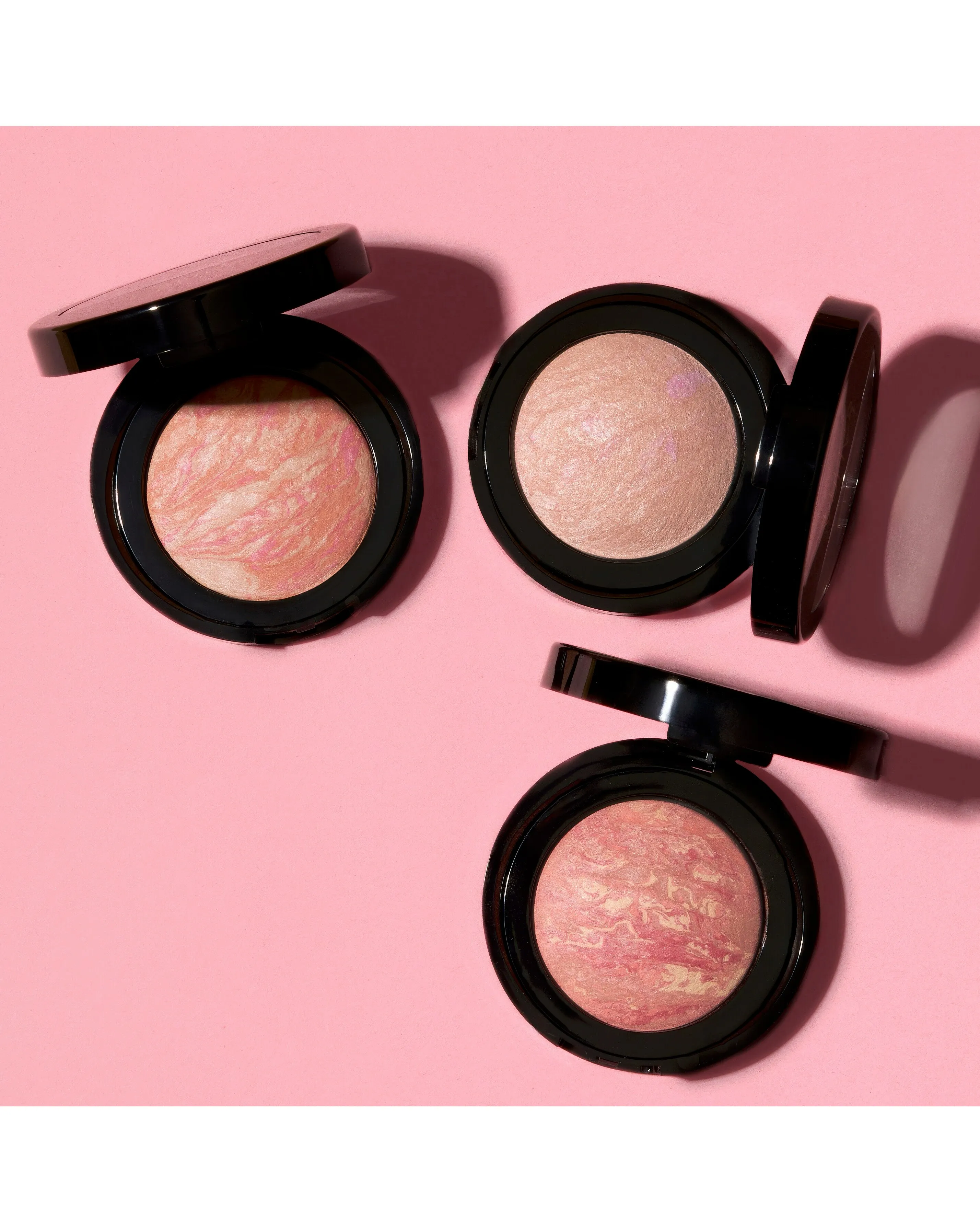 141470-laura-geller-baked-blush-n-brighten-marbleized-blush-tropic-hues-1.jpg