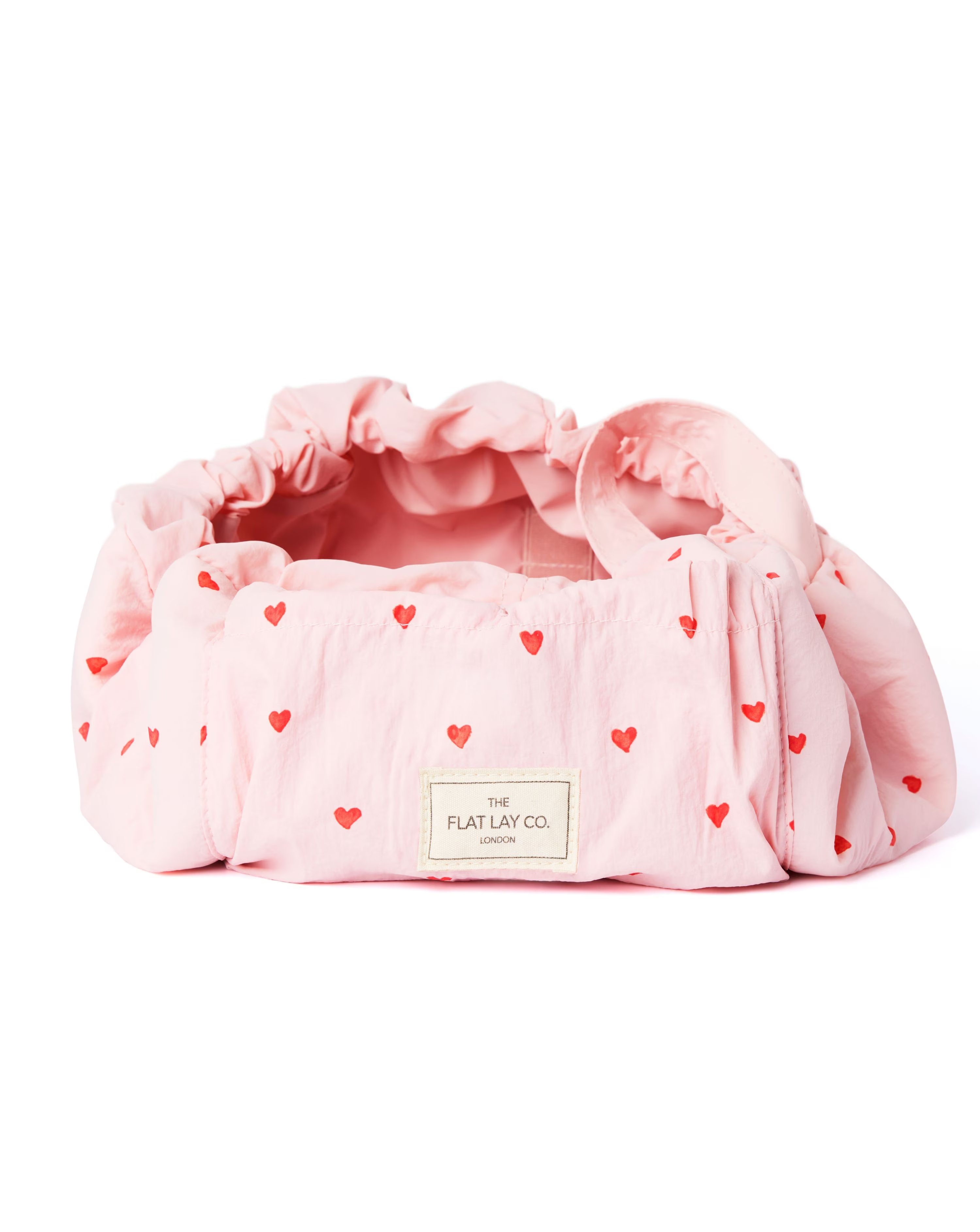 148691-the-flat-lay-co-marshmallow-drawstring-makeup-bag-in-pink-hearts-1.jpg